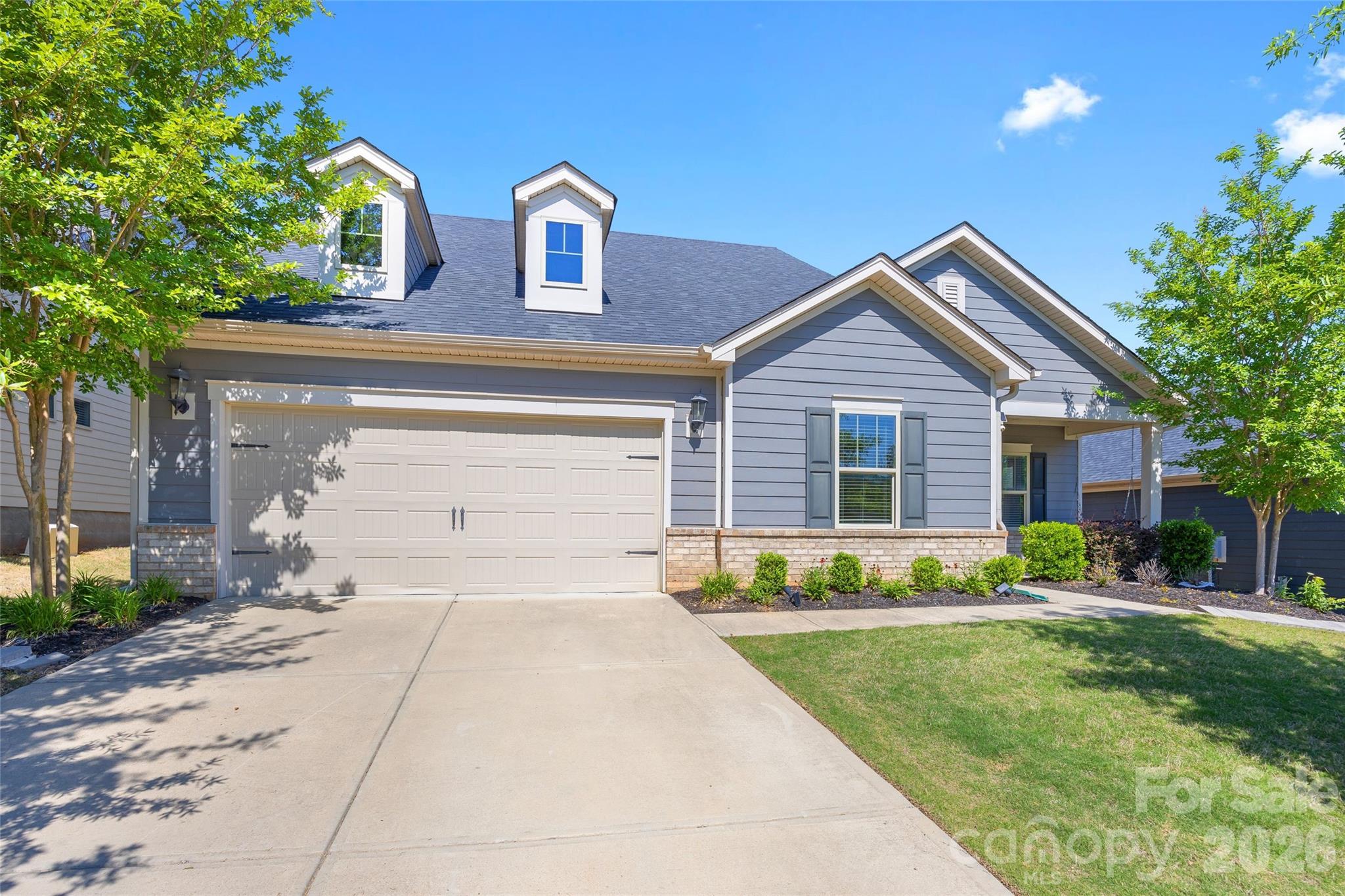This stunning 4BR/3BA home in The Meridians offers an open floor plan, a spacious primary suite down, and an oversized patio out back. The home features vaulted ceilings on the main floor, LVP flooring throughout, and large windows allowing for plenty of natural light. The kitchen is open to the living room and steals the show with an oversized island, SS appliances, a butler pantry, plenty of cabinet space, and quartz countertops. The primary suite is located directly off of the living room and includes a walk-in closet, a spacious primary bath, and plenty of natural light. Two additional bedrooms and a full bathroom round out the first floor. Upstairs you'll find an oversized loft—perfect for movie nights or a play area—plus another bedroom and full bathroom. Outside there's a screened porch, fully fenced yard, and a stone patio with a fire pit and pergola. Year round yard maintenance, a social membership to the Palisades Country Club (everything except golf), and access to all of the amenities including a large pool, tennis and pickleball courts, fitness center, club house, and walking trails are all included with your HOA fee.