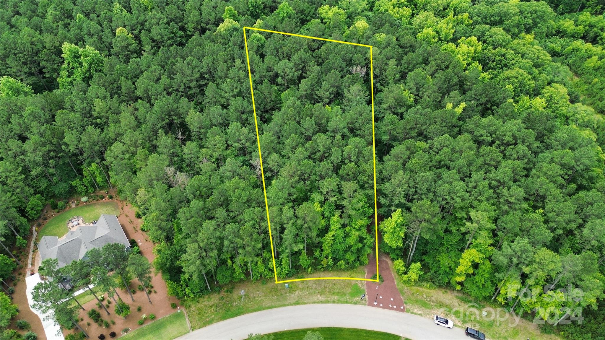 Bring your own builder to build a custom home in the wonderful Riverchase Estates community with beautiful custom homes throughout and a top of the line Clubhouse and amenities. This lot gently slopes and could potentially be a slab or crawl foundation, and backs up to the 500 acre Nature Preserve and Catawba River! Also for sale is the lot next door that could be combined together for a 1.69 acre parcel.