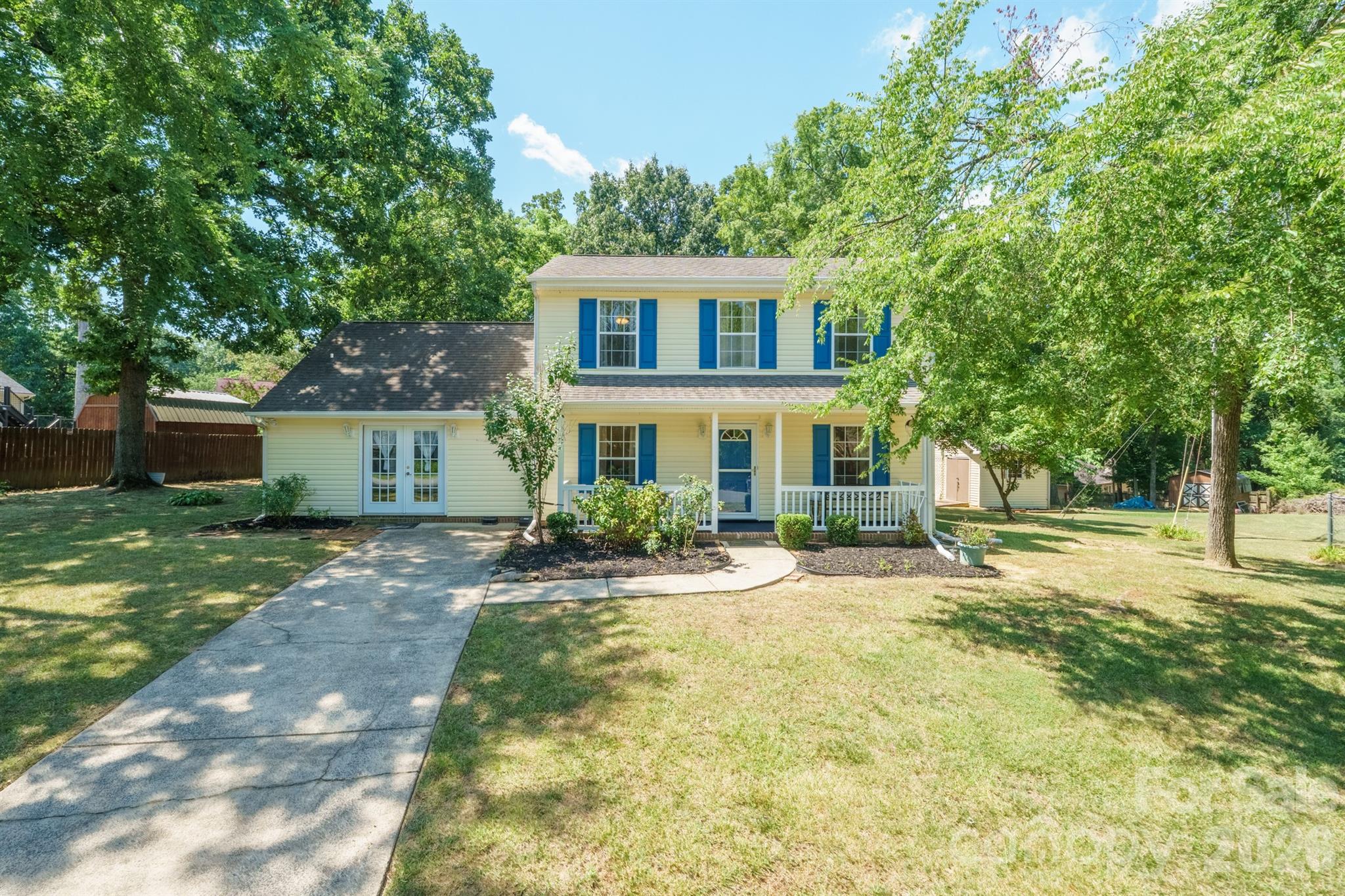 Located on Charlotte's rapidly developing westside, this property is LOADED with features and updates! Starting on the exterior, find a third of an acre lot on a quiet cul-de-sac with tons of landscaping (rose bushes, lillies, hyndrangea, etc), mature trees, covered front porch, new rear deck (2025), and an oversized shed with power run to it! Step inside and find engineered hardwood floors, tons of living space, formal dining room, ceiling fans throughout, French doors on front and back of the house, and a fully remodeled kitchen - reeded kitchen cabinets recently painted, several cabinets having pull out drawers, black herringbone tile backsplash, upgraded granite counter tops, single-basin undermount composite sink, wired-in under cabinet lighting, bay window, and all stainless steel appliances installed in the last 3 years (including GE Profile series refrigerator). Upstairs, all carpets were replaced in 2023. Guest bedrooms are ample size. Master bedroom has ensuite bathroom with walk-in shower, walk-in closet with washer/dryer, and an oversized walk-in attic providing tons of extra storage. All bathrooms had ceramic tile floors installed as well as new soft close, comfort height, elongated bowl toilets, and the master bath has heated seat with heated bidet. Entire heat pump system replaced in 2024 and has transferable parts warranty if new owner stays on maintenance plan. Water heater replaced in 2025. Great proximity to Mountain Island shopping and dining, schools, highway, and airport. Washer, dryer, and refrigerator included. Stay cool this summer, as the owner had the entire HVAC system cleaned/serviced July 3rd, 2026! And best of all....NO HOA! Listing agent is the owner.