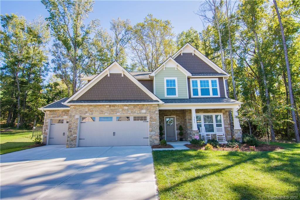 Like new 1-yr old home in convenient Fox Ridge. Beautifully decorated, move-in condition. Seller made all the best cosmetic selections. Fenced backyard on cul-de-sac private wooded lot great for pets! Walk to amenities, easy drive in any direction, close to 521, easy to 77 or 485. Great value w/ 3-car garage, huge drop zone, Kitchen feat. 2-tier island, granite, stainless, b'fast to patio, Butler's Pantry, prefinished HWs on main, Ofc/BR on Main. Master w/Sitting Room. Front porch. 10x12 patio.