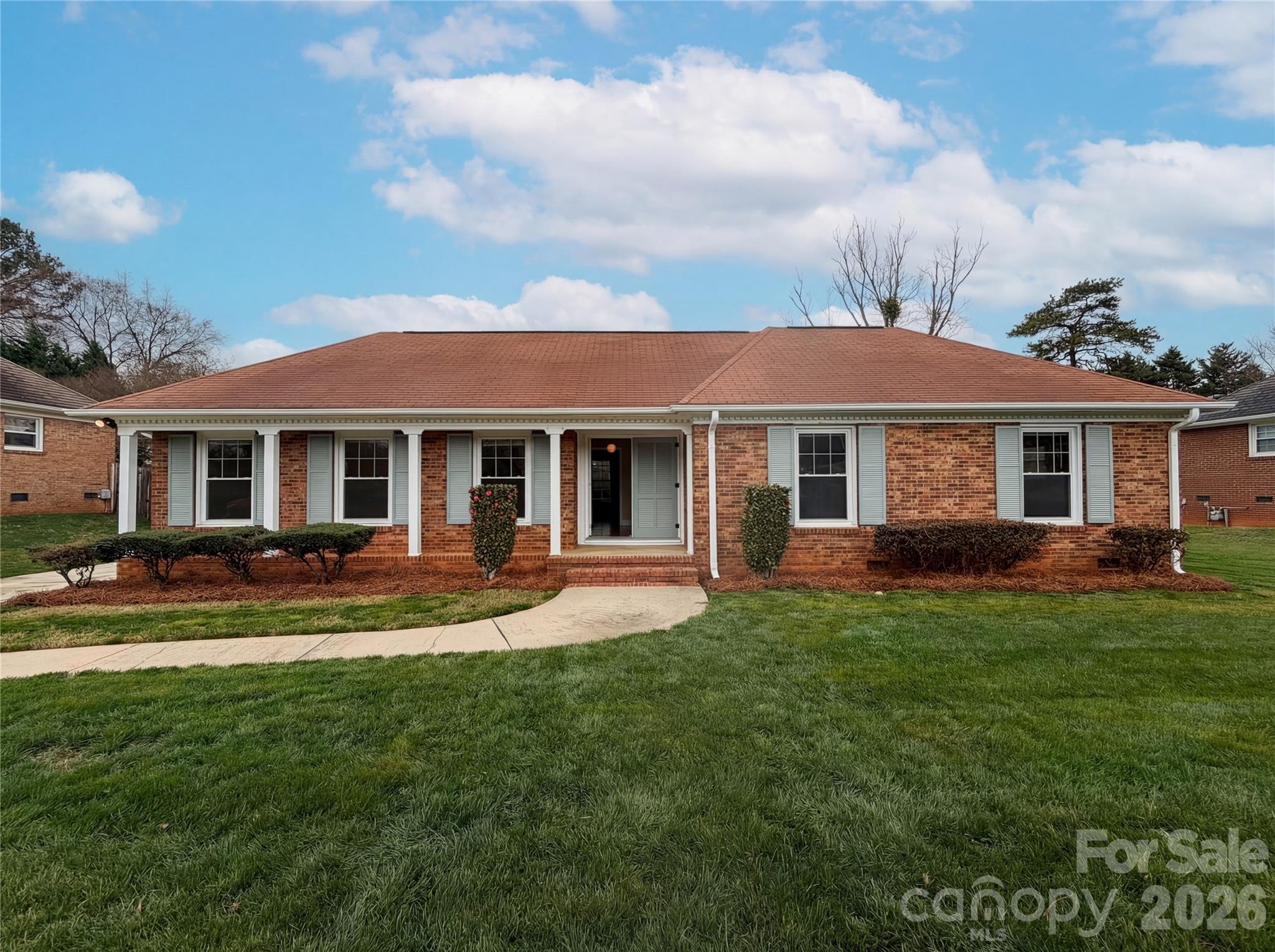 Charming all-brick ranch nestled in the desirable Montclaire area of Charlotte! This 4-bedroom, 2-bath home offers fantastic curb appeal and a layout that feels both comfortable and functional. Enjoy easy, one-level living with spacious rooms and plenty of natural light throughout. The screened-in porch is perfect for relaxing or entertaining while overlooking the yard. Conveniently located with quick access to major highways, shopping, and dining, and just minutes from Uptown Charlotte—this home truly combines location, charm, and everyday convenience.