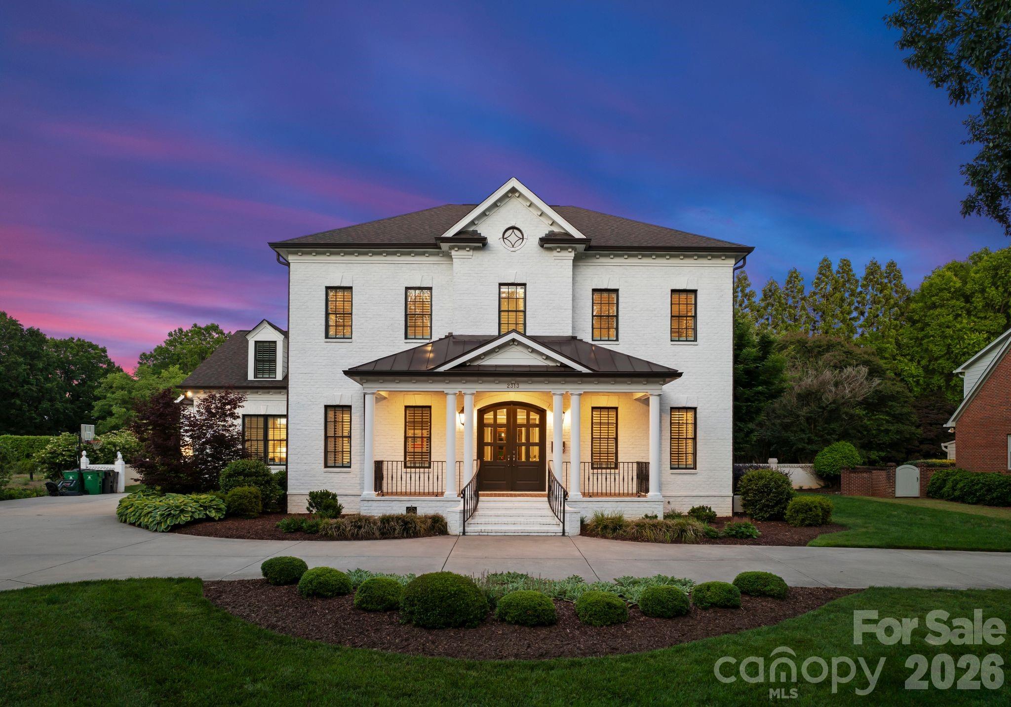 Beautiful brick home located in the highly sought after Deering Oaks neighborhood and situated on just over half an acre. This stunning custom home, completed in 2019, offers exceptional design, thoughtful upgrades, and modern comfort throughout. Filled with natural light and featuring hardwoods across all three levels, the main floor showcases an open concept layout with a spacious office, formal dining room, expansive great room, chef’s kitchen, and separate den. Designed for seamless indoor outdoor living, the covered porch overlooks a private backyard retreat complete with a beautiful pool, expansive green space, and upgraded iron fencing and gates, perfect for entertaining year round. Recent improvements include solar panels servicing the garage and pool, a new WiFi-enabled pool pump, and extensive smart home technology throughout the property, including hardwired internet, whole-home WiFi, integrated speakers, TV wiring, and alarm system capabilities.  The upper level features a large bonus room, laundry room, and three guest suites, each with private baths. The third floor offers an additional bedroom, full bath, and flexible bonus/bedroom space, along with a UV light filtration system installed on the HVAC for enhanced air quality.  A detached garage with a fully finished second-floor gym and full bath provides exceptional flexibility for wellness, guests, or a private studio. Additional notable upgrades include two Tesla high-speed chargers, a replaced mini-split system in the gym, and a professionally sealed crawlspace with dehumidifier and BioShield antimicrobial treatment for added efficiency and peace of mind.