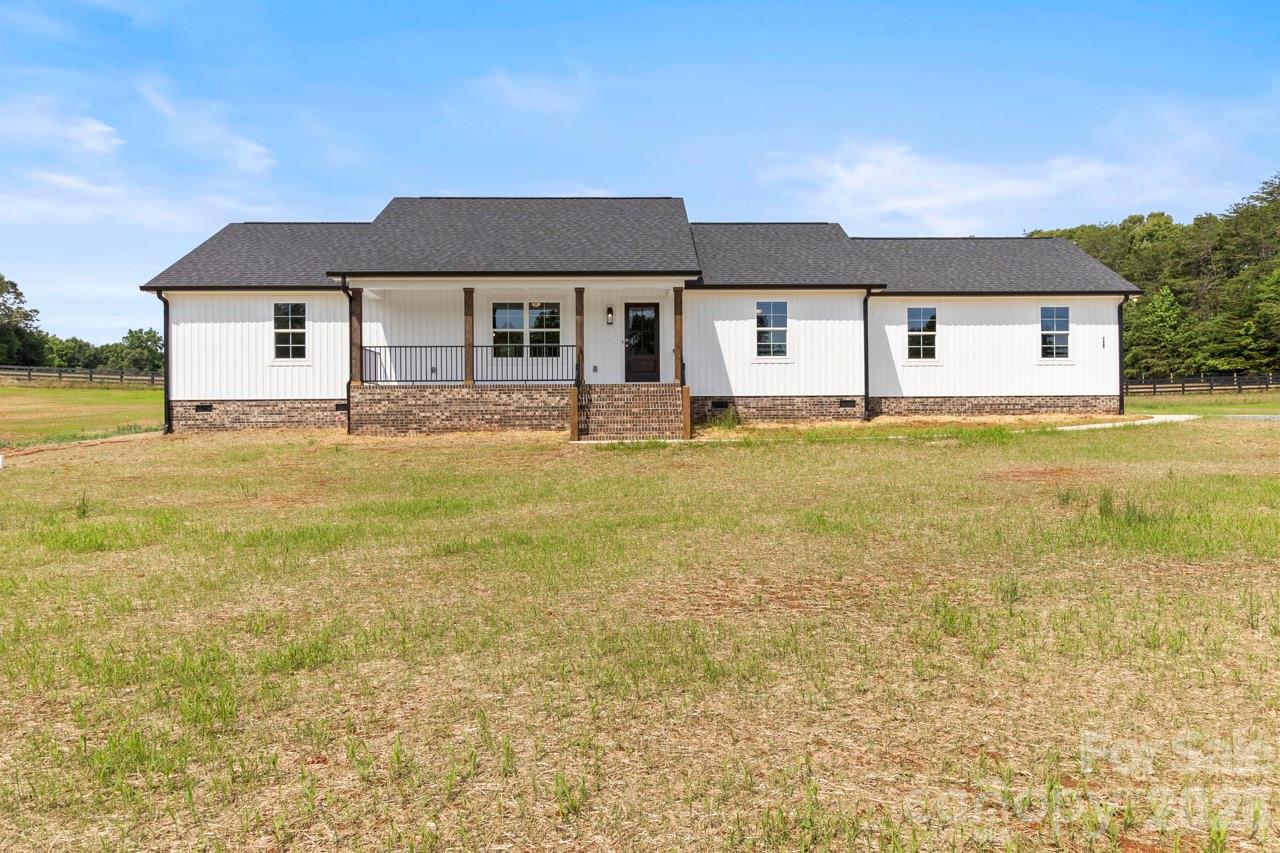 At 725 Alf Hoover Rd, your look for a new home with wonderful finishes will be complete when you walk into this new build. You may have driven by this home build, now it's time to come tour inside; built on a large country lot by a highly revered local home-builder, Key Builders.

Features: 
-3 bedrooms, 2 baths
-1604ft2 +/-
-Crawlspace foundation
-Large .85 acre +/- parcel in the country, close enough to town
-Gorgeous granite countertops in kitchen & quart in bathrooms
-Shower with shower door in primary bathroom
-A large 24'x24' side-load garage, sheet-rocked & premiered
-Whole exterior board and batten vinyl siding
-Architectural shingles
-Masonry front covered porch with beautiful stained posts, & black metal rails
-Vaulted ceiling in kitchen/living/dining
-Cabinet hood in kitchen
-Refrigerator panels and deep cabinet above
-All wood soft-close cabinets
-Rear patio door with built-in blinds
-Boasting durable Revwood flooring by Mohawk in kitchen everywhere except carpet in bedrooms & their closets.
-HVAC vents and returns in ceiling for your maximum convenience of furniture placement
-Craftsman trim
-Electric motor garage with clickers
-Septic system located in the front yard