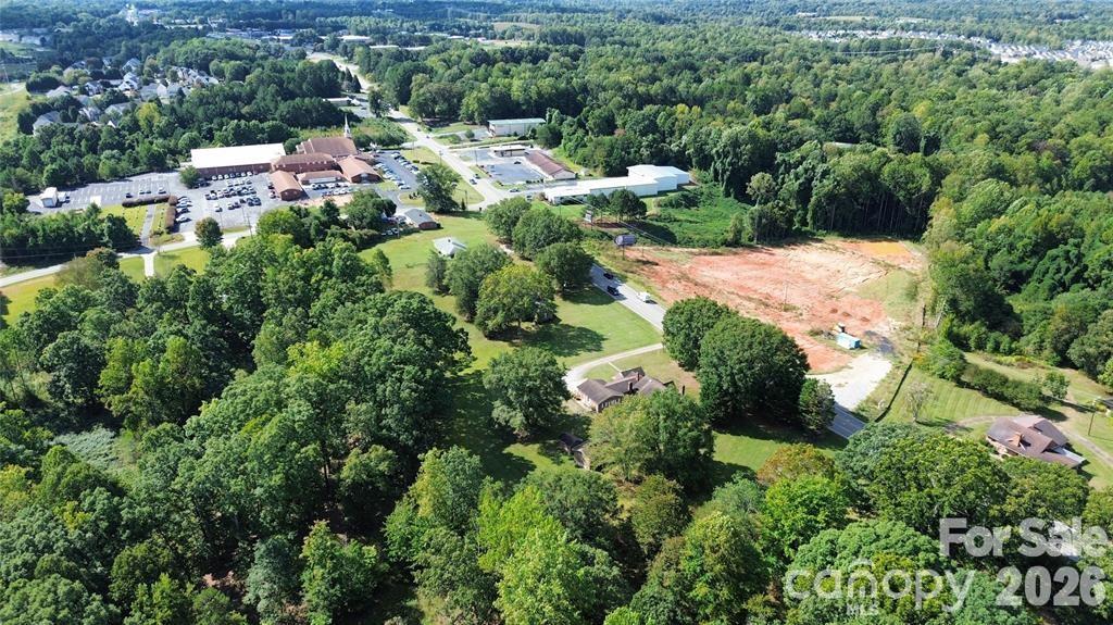 Come take a look at this beautiful 4.24 acre parcel in the heart of Denver located on business highway 16. This property has two entrances off of business 16 and an easement off of Lakeshore Road south for access. It is zoned ELDD R-SF. Lincoln County Future Land Use Plan supports rezoning for commercial development. 17,000 average daily traffic per NCDOT. PLEASE DO NOT WALK THE PROPERTY WITHOUT CONTACTING THE AGENT.