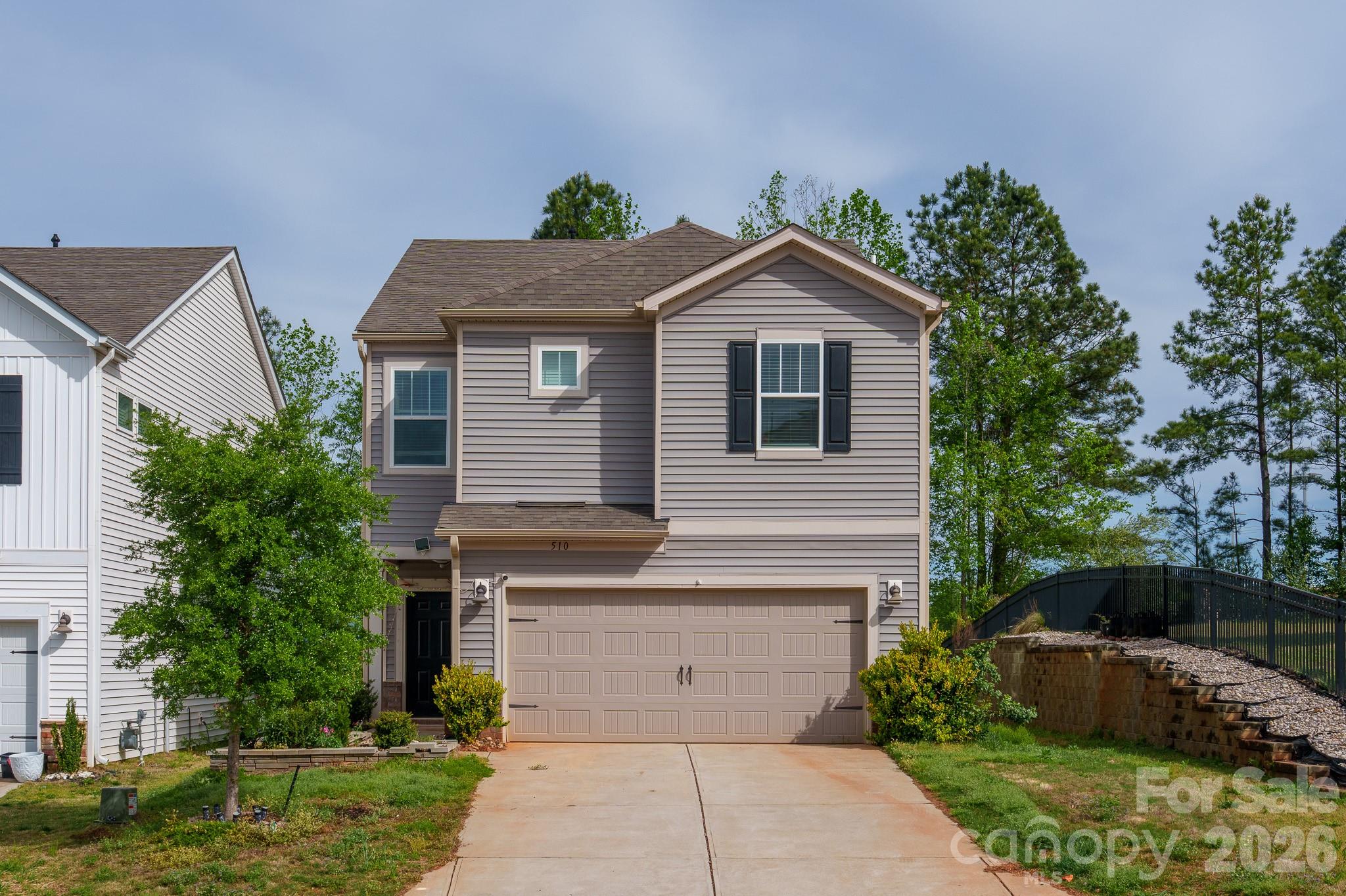 Beautiful single-family home for sale in the highly desirable Anniston Chase community in Fort Mill. This thoughtfully designed home features a spacious layout with 3 bedrooms and 2.5 bathrooms, perfect for comfortable family living.

Enjoy a larger, upgraded backyard that backs to a peaceful wood line—ideal for kids to play, relaxing outdoors, or hosting picnics. Inside, the open-concept main floor offers a bright and inviting living area centered around a modern kitchen with a large island, perfect for entertaining.

The home showcases stylish finishes from the Elemental package, including linen cabinetry, white and grey granite countertops, brown and grey EVP flooring, and multi-tone carpeting throughout. Upstairs, unwind in the private sitting area within the primary suite, creating a perfect retreat at the end of the day.

Located in the sought-after Fort Mill area, Anniston Chase offers energy-efficient bungalow-style homes designed for a healthier, quieter lifestyle while helping you save on utility costs. Conveniently situated just minutes from shopping, dining, entertainment, and top-rated Fort Mill schools.