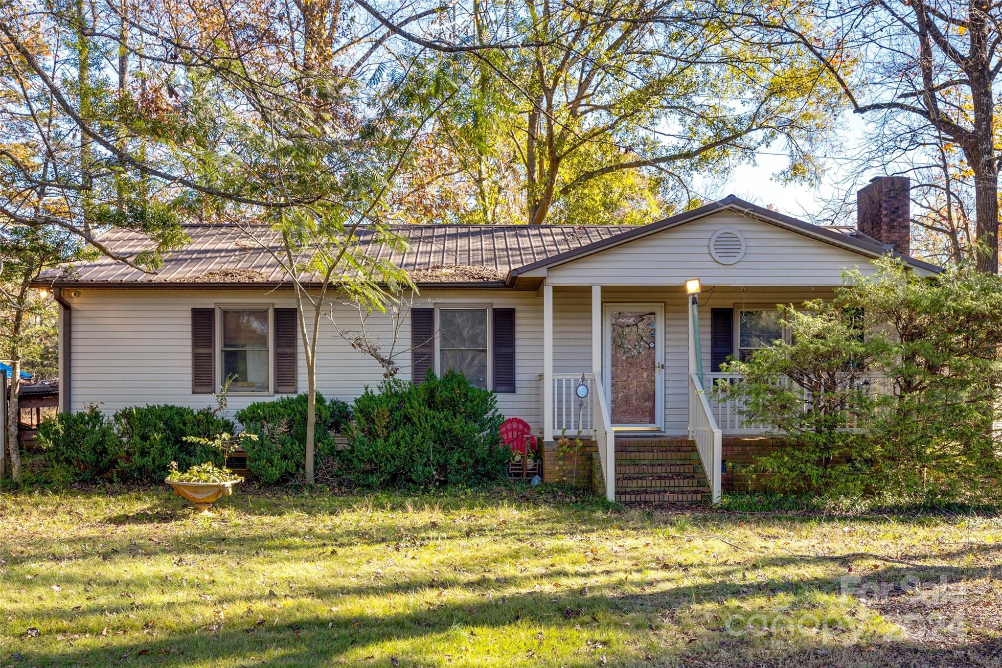 Perfect investment opportunity located in Belwood! This property sits on a little over 2 acres with NO HOA. Enjoy the quiet private oasis this property has to offer. Book your showing today, this one wont last long!