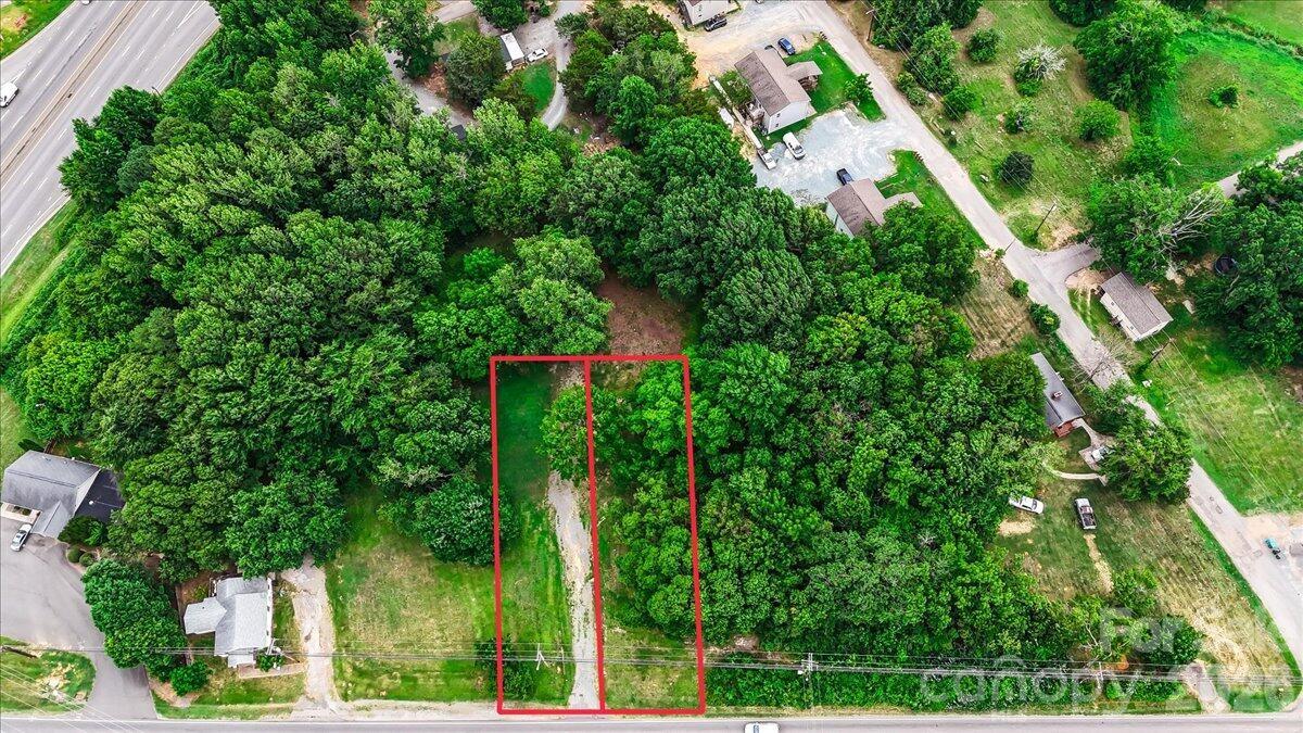 Unlock the potential of two adjacent lots totaling approximately 0.49 acres in Monroe's expanding north side. This unique offering provides exceptional flexibility for buyers seeking residential, commercial, or mixed-use possibilities under the current zoning. Surrounded by established homes and conveniently located just minutes from Monroe's commercial corridor, the property enjoys a setting that bridges residential appeal with nearby business opportunities. With a history of residential use and two parcels conveying together, buyers have added flexibility to explore a variety of development concepts. Whether you're looking to build, invest, or expand your portfolio, this is a rare opportunity to secure two adjoining parcels in an area experiencing continued growth and investment.