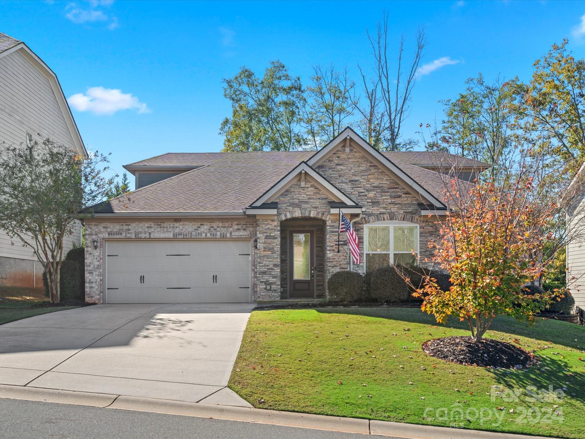 Located in a highly sought-after community, this home offers river access, scenic walking trails and a lifestyle of convenience & beauty. 4 spacious bedrooms, 3 full bathrooms & one additional half bath, a versatile bonus/flex space, and a dedicated office with glass panel french doors, this home has it all. Impeccable maintained with numerous updates, this home features arched doorways, an open floor plan, and a premium kitchen package complete with upgraded cabinets, granite countertops, 5-burner gas cooktop, undermount motion-sensored lighting, pendants over large island, storage cabinets in island, & recessed lighting. The crown molding, built-in shelving in den & closets, & a cozy gas fireplace set against a striking stone wall all add to it's charm. Custom closet shelving, multiple storage spaces, a designated mudroom, a screened back porch, laundry room on main with wall cabinets & additional storage shed also add to functionality & comfort. Easy access to shops, dining & more.