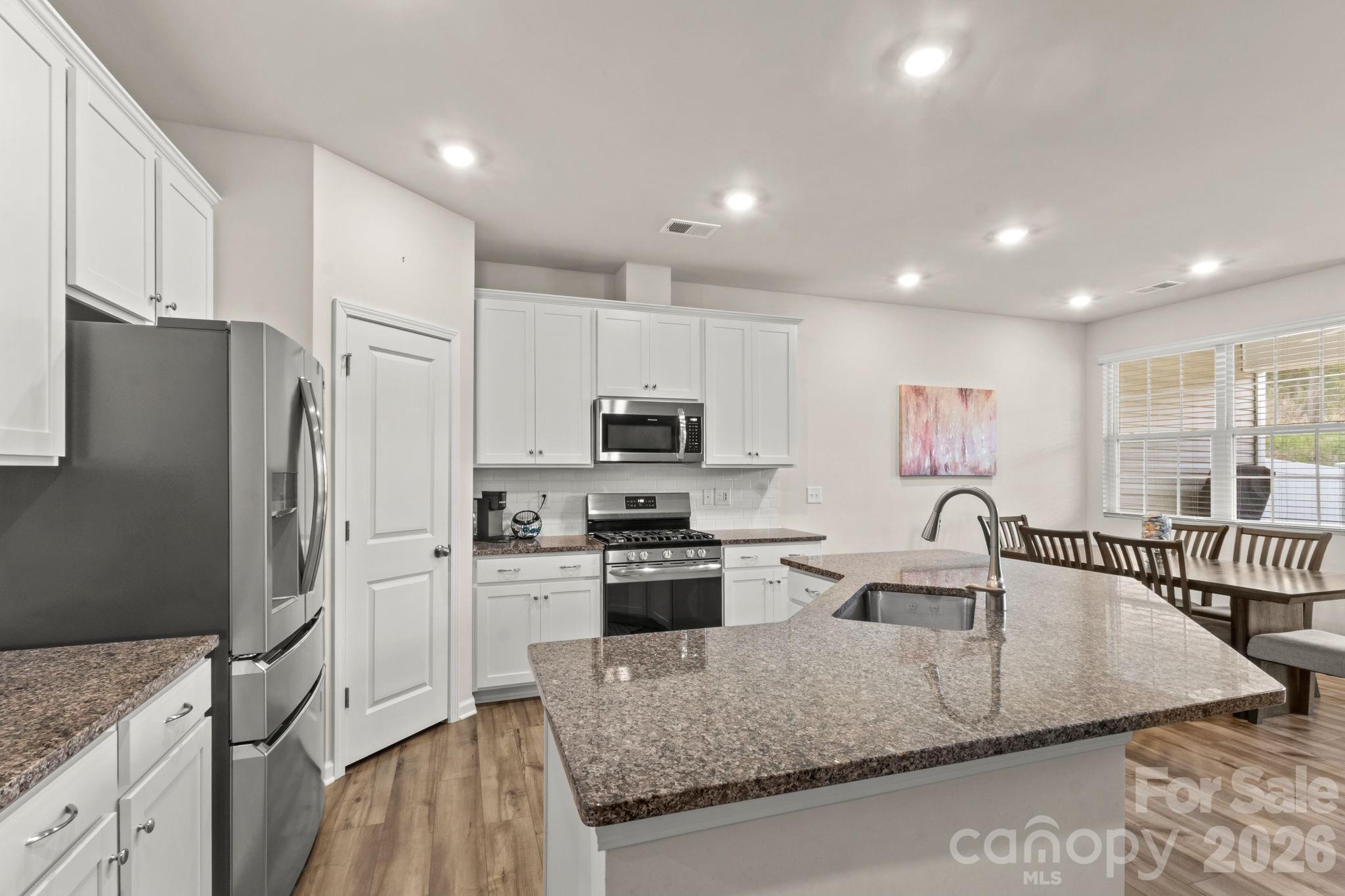 Special financing opportunity available! Qualified buyers may be eligible for 100% financing with no mortgage insurance and up to $10,000 in lender assistance that can be used toward closing costs, a rate buy-down, or loan amount reduction.

Welcome home to this beautifully maintained 3-bedroom, 2.5-bath townhome w/one car garage in the highly desirable Chateau community! From the inviting covered front porch to the bright, open-concept floor plan, this home is designed for comfortable everyday living and effortless entertaining.

The spacious main level is filled with natural light and offers a seamless flow between the kitchen, dining, and living areas, creating the perfect space to gather with family and friends. Beautiful white cabinets, stainless steel appliances and nice size walk in pantry. Whether you're preparing meals, hosting game night, or simply relaxing at home, you'll appreciate the thoughtful layout and welcoming atmosphere.

Step outside to the screened porch and enjoy your own private retreat —perfect for morning coffee, evening conversations, or simply unwinding after a long day with privacy.

Ideally located near Fort Mill, Lake Wylie, shopping, dining, entertainment, and Carowinds, this home offers the perfect combination of convenience and lifestyle. With easy access to major highways and everyday amenities, you'll enjoy everything this growing area has to offer.

Don't miss your opportunity to own this move-in-ready home that combines comfort, location, and exceptional financing opportunities all in one package!