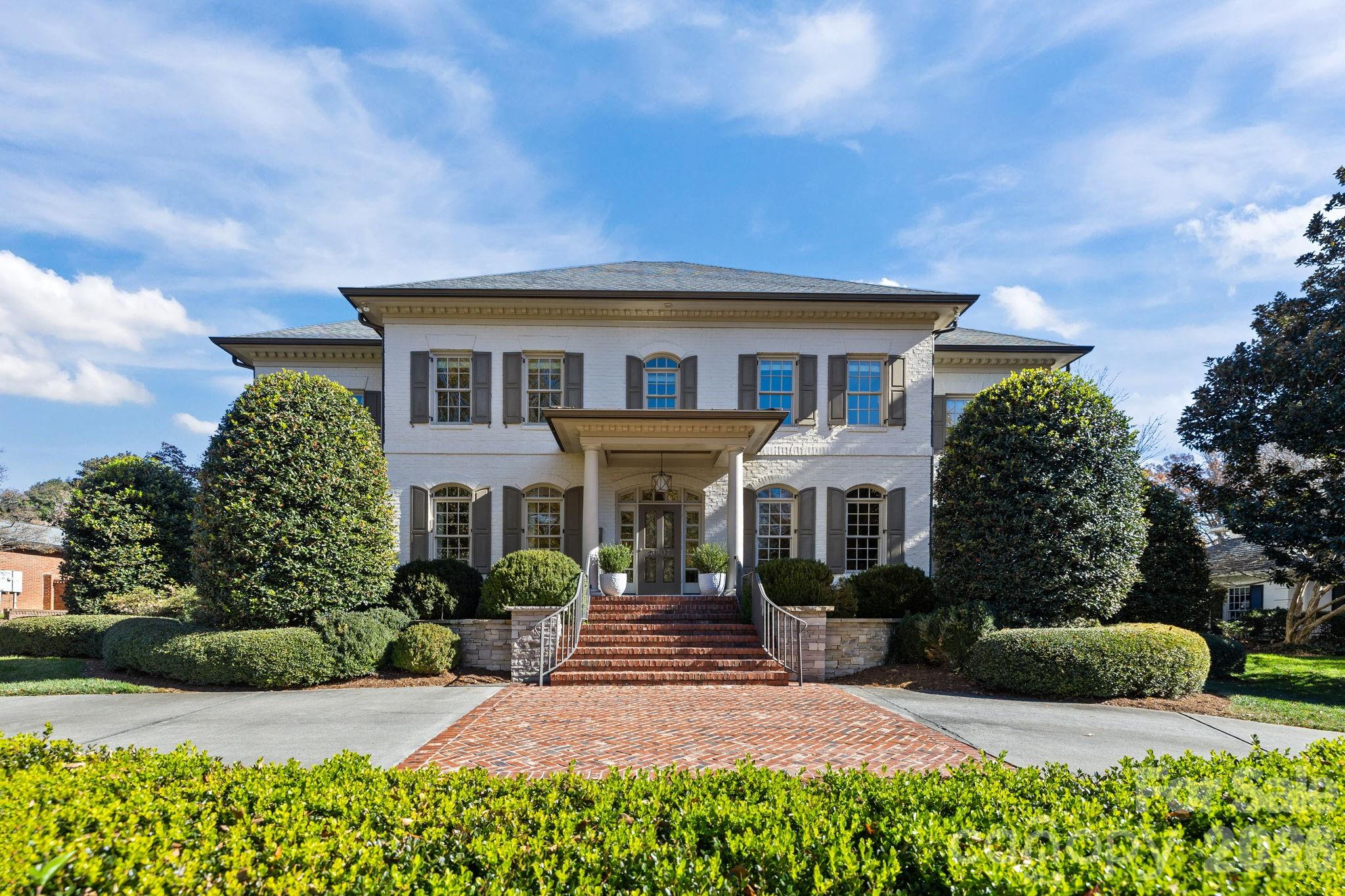 Incredible 5 bedroom home nestled in the middle of Foxcroft. This exquisite custom residence built by Stan Howey blends timeless elegance with thoughtful, modern concepts. Designed with an open floor plan & endless natural light, the living spaces flow seamlessly, creating an inviting atmosphere for both everyday living & entertaining. Every room was carefully considered, resulting in well-proportioned, highly functional living areas. The wide entrance foyer with views through the house into the gorgeous back yard is open to the dining room & living room (or formal office) on either side. The huge gourmet kitchen includes marble countertops, a spacious center island with bar seating & stainless steel appliances. Walk-in pantry, a laundry room with excellent storage, a home office & back drop zone all within steps of the kitchen & the center of the home. The kitchen is open to the great room & breakfast area as well. Walls of windows open the main living areas to the outside living from all angles. The great room includes a gas fireplace with flanking built-in shelving. The primary suite on the main level provides a serene retreat with a spa bathroom & two walk-in closets. Dual staircases access the upper level which includes four secondary bedrooms, each with access to its own bath—ideal for family & guests. Adding to the home’s versatility are a huge rec room and additional flex space on the upper level.  Plus, two expansive walk-in attics, one conveniently located off the rec room & another on the third floor, easily accessible by stairs, offering exceptional storage or future expansion potential.  The outdoor living is equally impressive with a covered porch with a wood burning fireplace & a custom hot tub / pool (added to the property in 2021) all surrounded by professionally designed mature landscaping for complete privacy. Everpure water filtration system. Central vac. Front & rear irrigation. Three car garage with Polyurea floor coating & an electric car charger. Easy walk to the neighborhood pool and tennis club via sidewalks. (individual membership required)