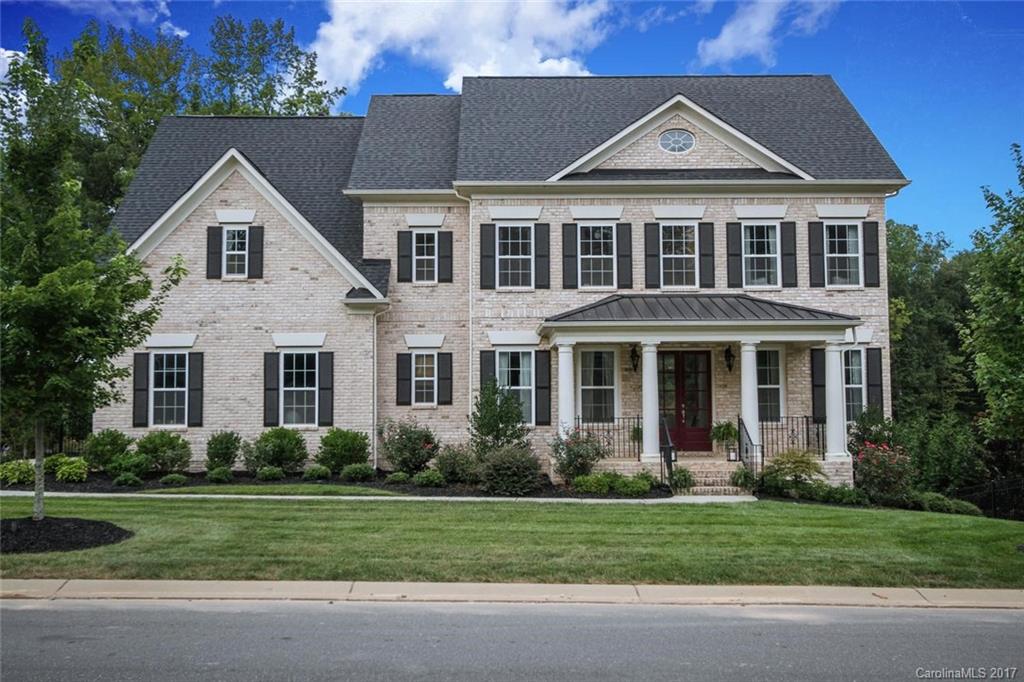 Beautiful John Wieland built home! Full white brick exterior with 3 car side entry garage. Sellers put in 100k worth of upgrades after moving in! Gourmet kitchen with many upgrades, commercial grade 6 burner Thermador range and hood, separate wall oven, 42" white cabinets, and large island. Large rooms offering many options for layout, finished 3rd floor bonus can be used as bedroom. Large deck outside with extensive landscaping and large mature trees behind. Neighborhood resort like amenities!