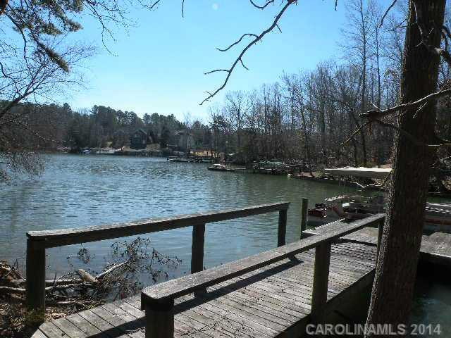 BEST PRICED WATER FRONT LOT LOCATED IN THE FORT MILL SCHOOL DISTRICT W/DOCK IN PLACE!!! APPROX. 5.14 ACRES (CAN BE DIVIDED), APPROX. 250 ' OF WTR FTG (150' OF THIS IS DEEP WATER). EXCELLENT SW EXPOSURE, BEAUTIFUL VIEWS ACROSS TORRENCE CREEK OF LAKE WYLIE. SECLUDED BUILD SITE. CURRENTLY LISTED AS TIMBERLAND, TOTAL 2013 TAX BILL FOR 5.14 AC. WAS $5.83. MINUTES TO I-77 & HWY 49. BRING YOUR BUILDER!!!