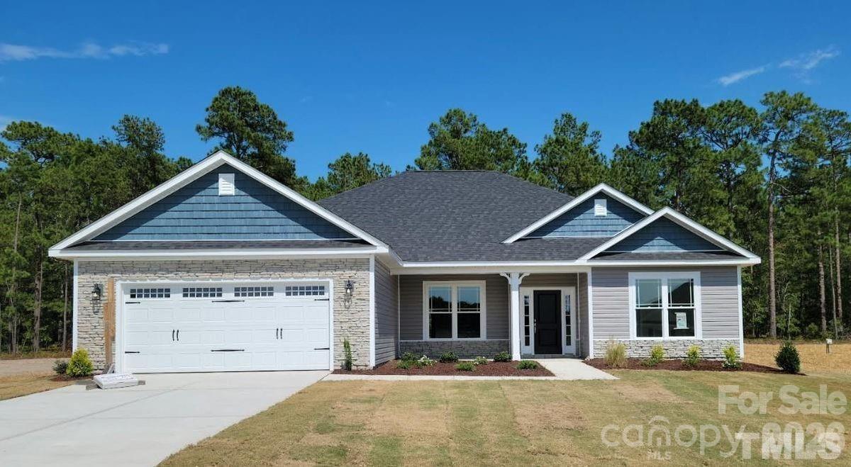 This brand new 3 bed, 3 bath ranch home in a country setting is situated in the beautiful Cardiff Glyn community. This amazing 2140 sf home boasts a formal dining room with coffered ceilings & a spacious open kitchen with very large island overlooking the family room with electric fireplace. Primary bedroom has vaulted ceilings. Primary bath has walk in closet, tile shower, and Quartz countertops. Home boasts a spacious deck off kitchen with beautiful acreage behind it. Granite countertops in kitchen, tiled kitchen backsplash, stainless steel appliances and laminate wood floors throughout main areas are the many included upgrades in this home. 1, 2, 10 warranty.  Flex Cash available and Closing Costs (except prepares and points) paid by seller with use of preferred lender only. Promo subject to change without notice. Call Listing agent to discuss current incentives.

photos are representative and may not reflect exact colors or features as the home being built