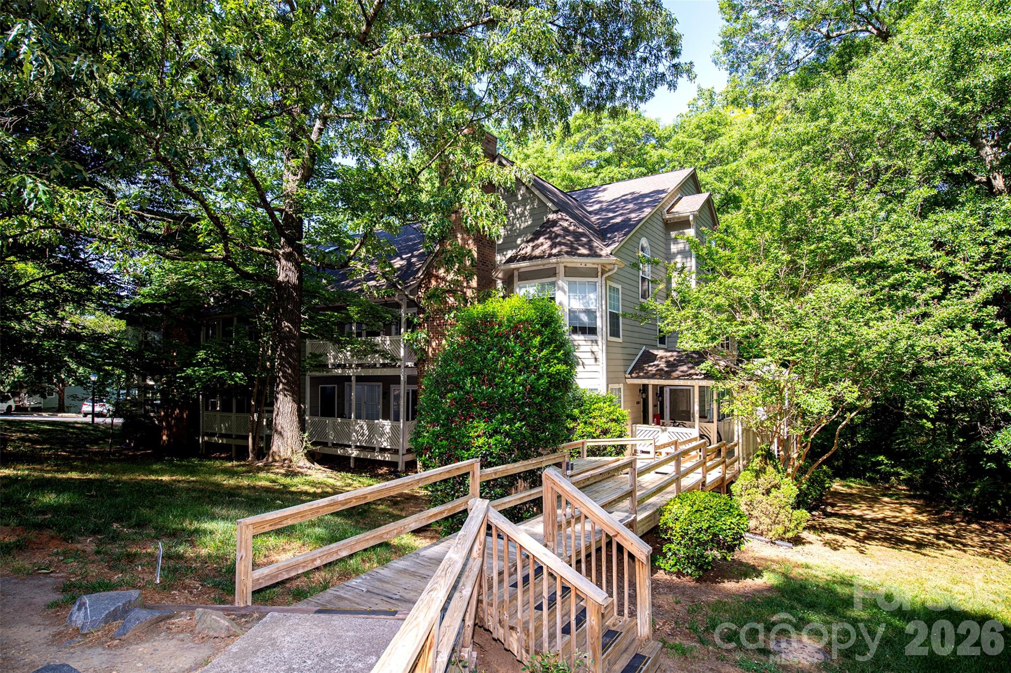 Tucked away in the back of sought-after Bennington Woods, this beautifully updated 2-bedroom, 2-bath condominium offers the feeling of living in a private treehouse surrounded by nature. With 1,276 square feet of light-filled living space, this home features soaring vaulted ceilings in the main living area, creating an open, airy atmosphere throughout. Enjoy peaceful wooded views from the privacy of your home while also having direct access to the Greenway just steps away. The spacious floor plan offers generously sized rooms, hardwood floors and carpet throughout, fresh interior paint, and a bright kitchen complete with granite countertops. There are two flex space areas - one perfect for a WFH space with great light over looking treed back area and the other at the top of the stairs - perfect for a multitude of things! Residents of the community also enjoy access to the neighborhood pool, making it easy to relax and unwind. There is also a wonderful back deck overlooking the greenway! Rarely do you find a condo that combines this level of privacy, natural beauty, and convenience in such a desirable location.
