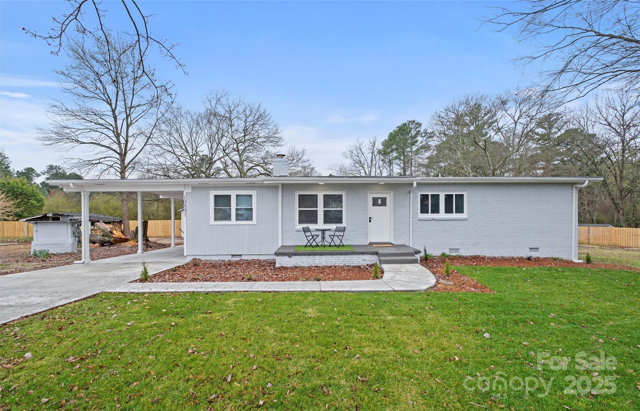 Location, location, location! Discover the charm of easy ranch living at 10891 Pettus Rd, a completely remodeled 3-bedroom, 2-bath gem on a lush 0.83-acre lot. This move-in-ready home features a bright open layout, custom kitchen with modern finishes, upgraded flooring, lighting, and fresh neutral paint throughout. Both baths are beautifully refreshed with spa-like tile showers and contemporary fixtures. Enjoy peace and privacy with wide-open yard space for outdoor living, gardening, or future expansion. Just minutes from Ballantyne’s shopping, dining, and commuter routes, you get country serenity without sacrificing convenience. Two septic tanks and a subdividable lot add flexibility and long-term potential. No HOA—bring your vision and make it your own! Back on market due to inspection issues. The home is being sold AS-IS