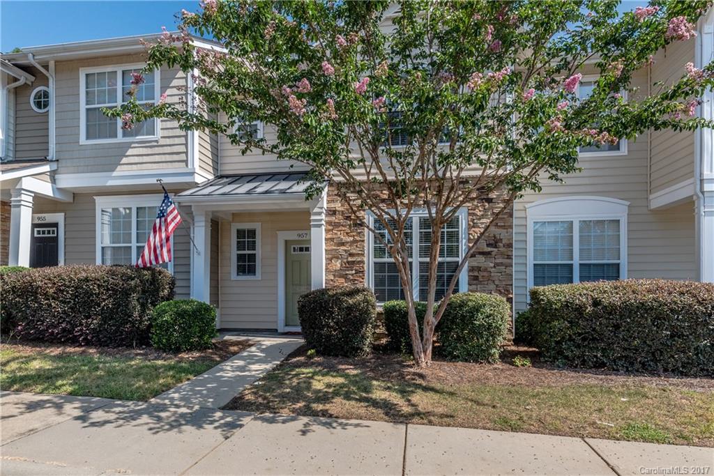 Welcome home! Rocking chair front porch, Dining Room/office w/decorative crown molding & wainscoting, Stunning kitchen with granite countertops, oversized kitchen sink, breakfast bar, SS appliances including fridge & lots of counter space. Spacious family room w/Gas log FP & wood floors on main, New carpet 2nd floor, Large Master suite with vaulted ceiling & walk in closet. Fenced-in extended back patio w/storage. Choice Plan HW, Community Clubhouse, Pool & award winning Fort Mill schools.