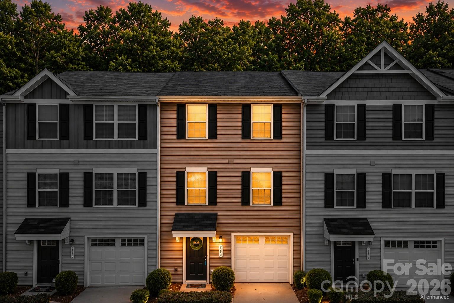 Welcome to easy, low maintenance living in this move in ready 3 story townhome with a garage and flexible spaces designed for today’s lifestyle. Whether you’re working remotely, hosting friends, creating a home gym, or looking for extra room to unwind, the versatile lower level flex space offers endless possibilities, plus an oversized storage closet for all your gear.

The open concept main level is filled with natural light and features a spacious living area, dining space, and kitchen with white cabinetry and included refrigerator. Step outside to the rear deck and enjoy peaceful wooded views, a rare level of privacy that backs to mature trees instead of neighboring homes.

Upstairs, the primary suite offers a walk in closet and private bath, while two additional bedrooms provide space for guests, family, or a dedicated home office. Washer and dryer are included for added convenience.

Enjoy a true lock and leave lifestyle with HOA covered lawn maintenance, pest control, trash, recycling, water, and sewer. Ample guest parking is located nearby, making entertaining easy. Conveniently located near shopping, dining, major commuting routes, and everyday essentials, this home combines modern convenience, functional living space, and the low maintenance lifestyle today’s buyers are looking for.