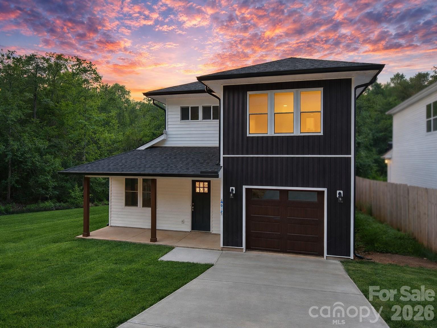 This beautiful custom house, have two lots together ( the 6609 address belong to the house as well),the house, offers an ideal blend space, functionality, and modern design. Inside, the house features a well-designed layout with abundant natural light throughout, including bright kitchen to open to the main living area and over looks the back yard. There is a formal room that can be used as dining room or an office The kitchen has a pantry, island and custom cabinets and granite courter space. the spacious primary suite is on the second level with large windows, and suite bath with shower and two sinks with vanity in between and large walk-in closet. Conveniently located with easy access to the Uptown Charlotte, as well as shopping, dinning and major highways, this home offers a unique blend of modern living space, and tranquility in a highly desirable location.