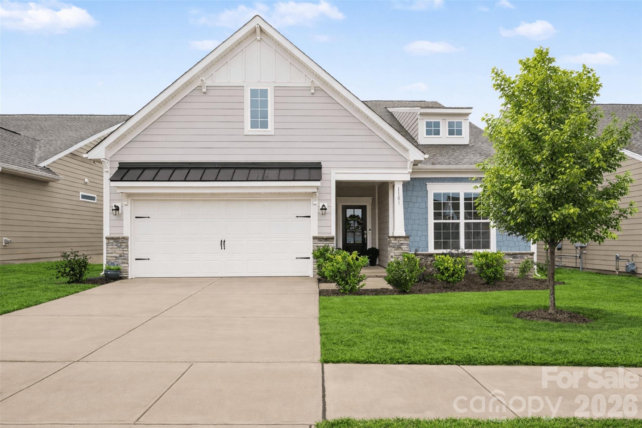 Better than new and anything but builder grade, this exquisite 2024 Lennar Dorchester model is a true showstopper, thoughtfully curated with upscale finishes and custom upgrades at every turn. From the moment you step inside, you’re greeted by beautifully painted designer interiors, upgraded lighting that sets a warm, inviting tone, and an extended great room anchored by a stunning fireplace—perfect for cozy evenings or lively gatherings.

The gourmet kitchen flows effortlessly into the living space, making entertaining a dream, while the main-level primary suite feels like a private retreat. Here, you’ll find a sitting area, access to a serene screened-in porch, and a custom Closets by Design walk-in closet that brings both luxury and function. Additional enhancements include elegant cellular shades, a composite deck overlooking the fenced backyard, smart Ecobee thermostats, termite protection, and a show-stopping garage with epoxy floors and hanging storage.

Set in the heart of the award-winning Fort Mill School District and just minutes from I-77, downtown Fort Mill’s vibrant events, dining, and top medical facilities, this home offers both beauty and convenience. The community completes the lifestyle with resort-style amenities—sparkling pool, clubhouse, fitness center, sport courts, walking trails, and playground.

This home truly stands out—move-in ready and loaded with premium features!