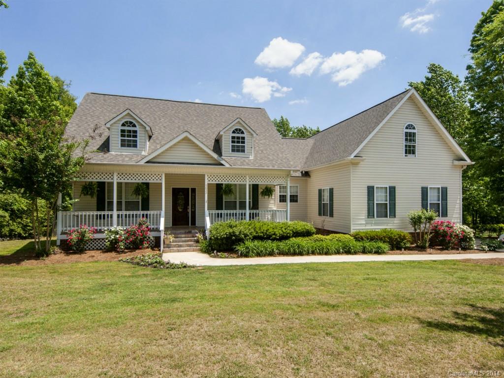 Gorgeous custom built ranch with high-end upgrades everywhere! 2nd living area! Spa quality master suite with tile shower and garden tub. Garage was finished to a 4th bedroom, full bath, and large laundry room-could be converted back. Must see the outdoor living patio! Large fireplace and outdoor kitchen! Level fenced back yard with carport and large storage building. Open entertaining floorplan, vaulted florida room with exposed beams. Upstairs bonus room or 5th bedroom. Must see, won't last long!