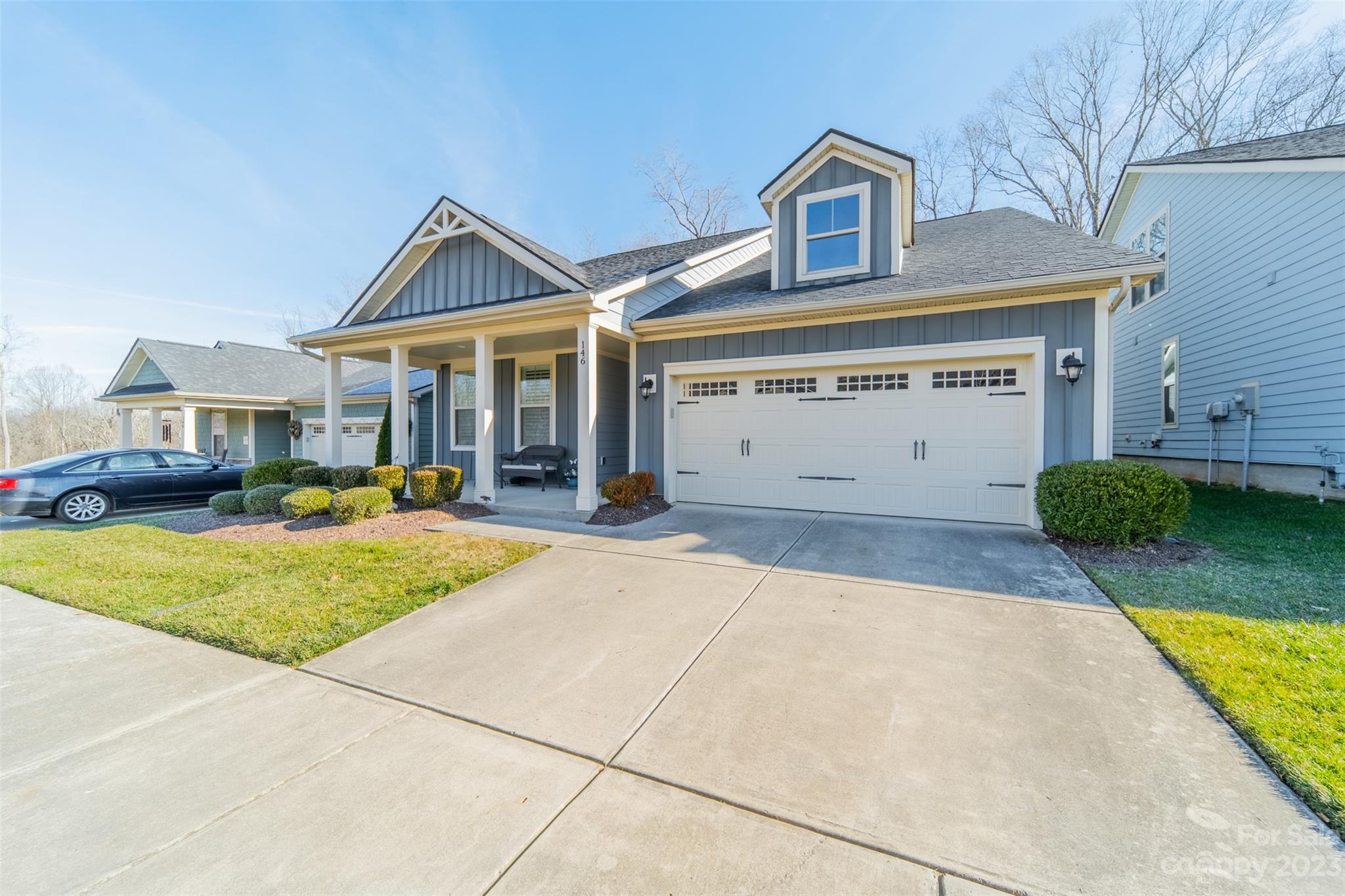 Enjoy this private 1.5-story patio home on a cul-de-sac lot with lawn maintenance included. The screened back porch overlooks a wooded area, and you can view the community pond from your covered, rocking-chair front porch! The primary suite is on the main level and has a walk-in shower. The great room features a gas log fireplace. The gourmet kitchen is upgraded with a 5-burner range, wall oven, and Frigidaire gallery appliances, and it has a walk-in pantry. The guest room has a full bath & there is an office/flex space on the main level. Also enjoy a sunroom, a walk-in shower in the upper-level bath, lots of closet space and plantation shutters throughout. Johnson Manor is a picturesque neighborhood offering walking trails, a clubhouse with gym, community garden, and a dog park. Served by award-winning MGSD schools, it is convenient to shopping and dining, and is just a short drive from downtown Mooresville, Davidson, Lake Norman, and I-77.