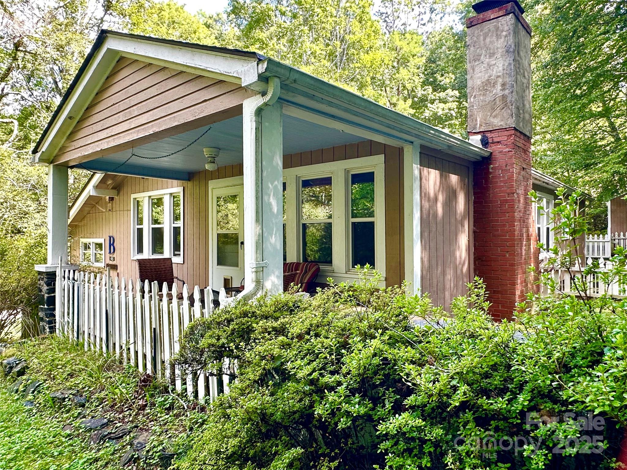 Price Reduced! Mountain Oasis Near Little Switzerland | 2 Bed, 2 Bath on 1.47 Private Acres. Escape to your own private slice of the Blue Ridge Mountains! This charming 2-bedroom, 2-bath rustic home sits on 1.47 beautifully wooded acres just minutes from the Blue Ridge Parkway and the historic Little Switzerland area.
Step inside and feel the warmth of true mountain character. The standout vertical knotty pine walls create a cozy, cabin-like atmosphere that’s both inviting and timeless. Natural light pours in through generous windows, highlighting the comfortable living spaces and seamless flow that makes this home feel larger than it is.
Outside living is the real star here: Spacious covered front porch perfect for morning coffee with mountain views
Fenced yard ideal for pets, kids, or peaceful evenings
Multiple outbuildings offering flexible storage, workshop space, or future projects
Deep privacy surrounded by mature trees, mountain laurel and nature. This is a true mountain lifestyle property with no HOA and easy year-round access. Whether you want a peaceful full-time home or a high-potential vacation rental (proven VRBO area), this one checks every box. Outdoor enthusiasts will love being minutes from:
Blue Ridge Parkway drives and hiking
World-class hiking, biking, fishing and waterfalls
Gem mining, arts communities, and local dining in Little Switzerland & Spruce Pine
Quiet, private and full of character — this is the mountain retreat so many people dream about but rarely find.
Don’t miss your chance to own this peaceful 1.47-acre mountain escape. Schedule your private showing today and come experience the tranquility for yourself!