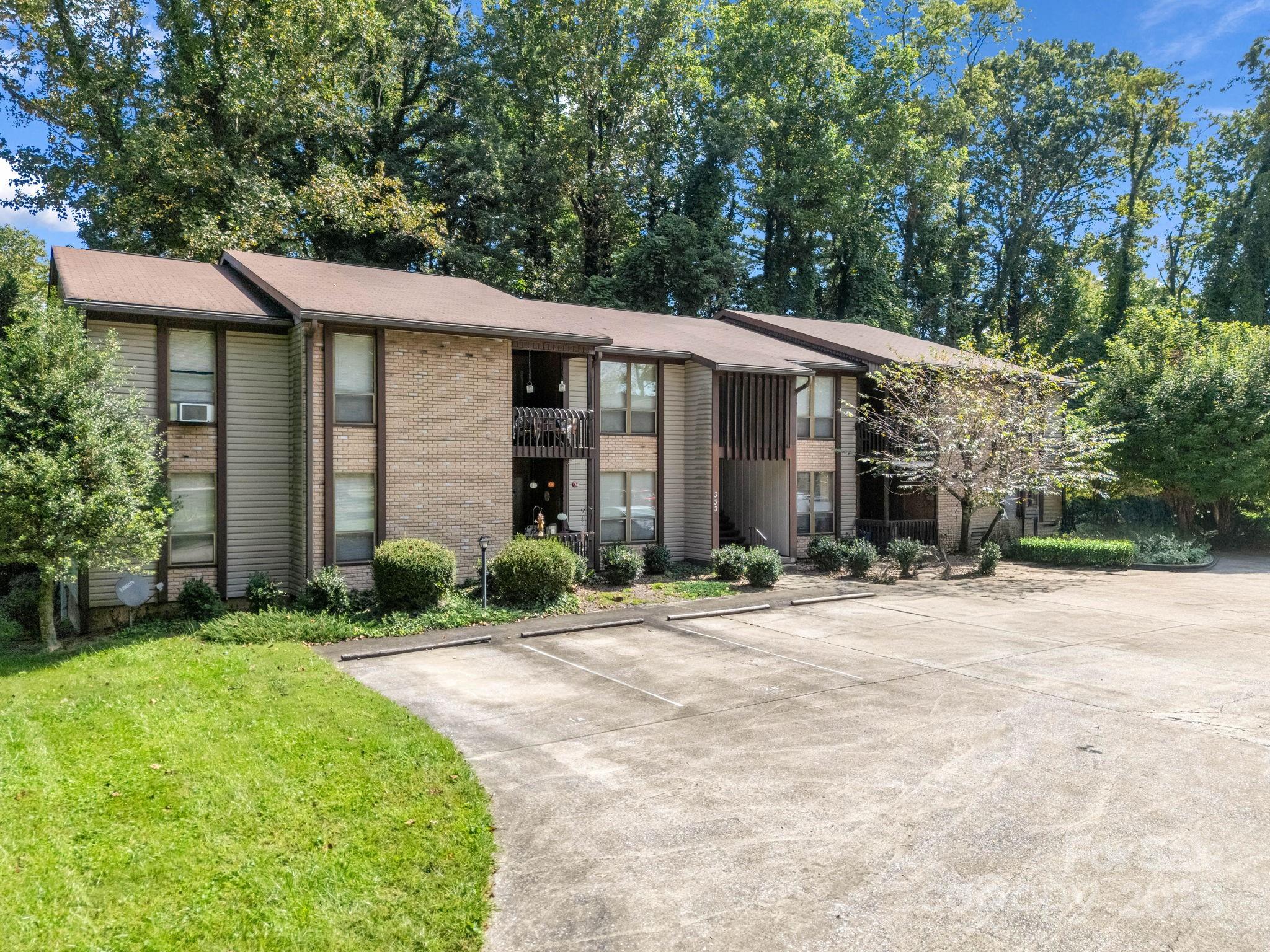 Rare offering just one mile from downtown Hendersonville—this exceptional 16-unit multifamily complex presents an outstanding investment opportunity combining location, quality construction, and long-term stability. Built and meticulously maintained by the original owner/developer, the property reflects pride of ownership and consistent care throughout. Consisting of two well-designed buildings, each thoughtfully constructed for functionality and ease of management, the complex features sixteen 2-bedroom, 1.5-bathroom units that provide comfortable living spaces ideal for long-term tenants. Each unit offers spacious interiors, well-equipped kitchens, and private outdoor areas, creating a desirable residential experience in a highly convenient setting. The property is fully connected to city water and city sewer and provides ample parking for residents and guests. Its prime location—just one mile to downtown Hendersonville’s vibrant shops, restaurants, and amenities—enhances tenant appeal and ensures continued demand. With consistent occupancy, low turnover, and a strong rental history, this is a truly turnkey investment opportunity in one of Western North Carolina’s most desirable and stable markets. The owner’s commitment to proactive maintenance and long-term quality is evident in every detail, making this a solid, income-producing property ready for its next chapter. Rarely do opportunities of this caliber—offering strong fundamentals, excellent parking, city utilities, and close proximity to downtown—come available. This 16-unit complex represents a legacy asset in a thriving market, ideal for investors seeking a high-quality, well-located multifamily holding in Hendersonville.