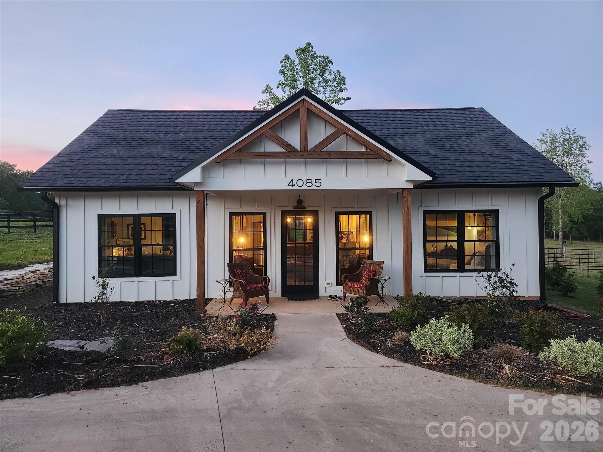 This custom, light-filled home with 9 ft ceilings is directly on the Foothills Equestrian Trail Association with its over 150 miles of horse only trails. Located just 5 minutes from the charming town of Landrum with its myriad of locally award-winning restaurants and just over 25 mins to the bustling larger towns of Greer, Spartanburg and Greenville, SC. Your horses will love the airy 24 - 65 ft pole barn, two pastures, 1/4 mile paddock paradise trail system, with shade provided by numerous old growth trees. Easily maintained with room to grow with its two additional deeded building sites for a garage/barn apartment and a guest home!