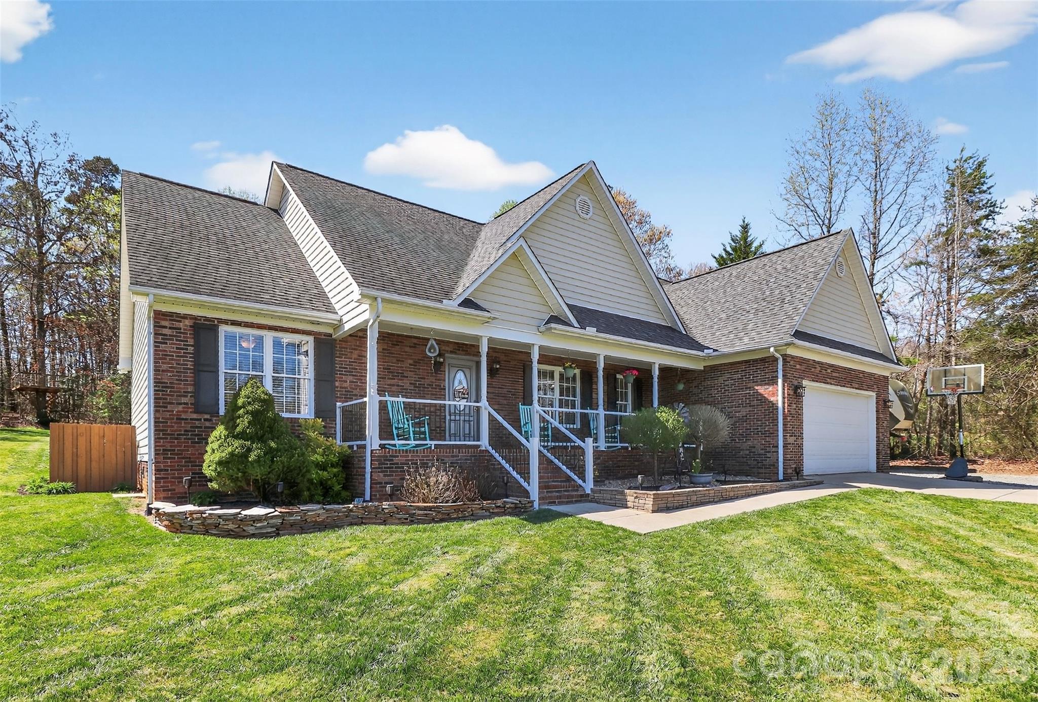 Welcome to 4363 Dusty Ridge Ct. Tucked away on nearly an acre, this beautifully maintained 3-bedroom, 2-bath ranch welcomes you with gleaming hardwood floors, a formal dining room, and a spacious great room featuring a vaulted ceiling and cozy gas fireplace.

Designed with both everyday living and entertaining in mind, the open-concept layout connects the kitchen—complete with a breakfast bar—to the great room, creating an inviting central gathering space. The split-bedroom floor plan enhances privacy, with the primary suite set apart from the secondary bedrooms. The primary retreat features a vaulted ceiling, walk-in shower, garden tub, and dual vanity.

Step outside and enjoy your own private escape. The deck with remote-controlled awning overlooks a peaceful, expansive backyard—ideal for morning coffee or unwinding in the evenings while taking in the natural surroundings and distant sounds of Lake Norman. The outdoor space continues with a large concrete patio, planter boxes, and endless room for recreation, whether it's hosting gatherings, adding a pool, or simply enjoying the open space.

Additional highlights include a new water heater and a fully encapsulated crawl space with dehumidifier and extra gravel parking—perfect for an RV, boat, or guests.

Ideally located near Rock Springs Nature Preserve, Lake Norman, and Highway 16, this home offers the rare combination of convenience and a private, tucked-away setting.
