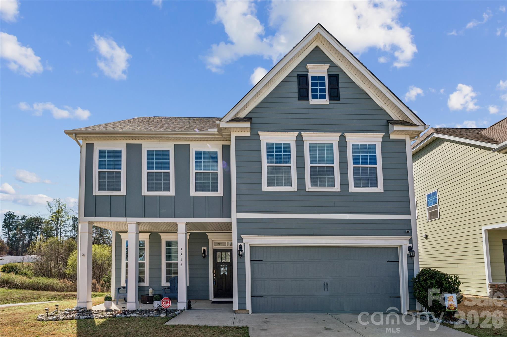 Welcome home to this beautifully maintained 4 bed, 2.5 bath home built in 2019, offering 2310 sq ft of living space in a vibrant, amenity-filled community. 
Inside, you'll find an open and inviting layout featuring prefinished hardwood flooring, granite countertops, and stainless steel appliances, along with a gas cooktop that will delight any home chef!  The living area is anchored by a cozy gas fireplace, creating the perfect space to relax or entertain.
The large primary suite offers a peaceful retreat with a tile shower surround, a separate soaking tub, and walk in closet.  Two of the other bedrooms have walk-in closets too.  
Thoughtful upgrades and features continue throughout the home, including a tankless water heater, CPI security system with two cameras and doorbell.  The exterior is built for durability with HardiePlank siding and 30-year architectural shingles.  BONUS for you apple lovers- there are McIntosh apple trees in the backyard!  
Step outside and enjoy everything the community has to offer, including a pool with a cabana, volleyball court, pickleball court, basketball court, playground and two picnic areas- perfect for gatherings!
This home blends modern comfort, quality construction, and fantastic neighborhood amenities- making it the perfect place to call home!
CPI garage door, front door lock and thermostat can be controlled from your phone.  Fiber optic has been run to the home.