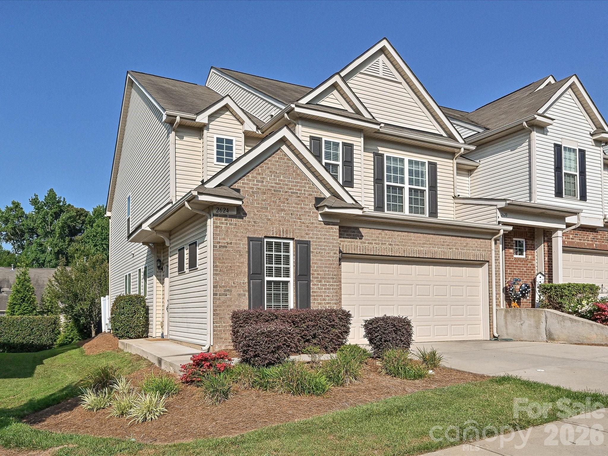 Welcome to this beautifully maintained, end-unit townhome in the sought-after gated community of Park South Station. Offering a desirable floor plan and a two-car garage, this home features a bright, open kitchen with antique white cabinetry, granite countertops, stainless steel appliances, a gas cooktop, a spacious pantry, and a large breakfast bar overlooking the inviting great room with a fireplace. The sunroom extension provides additional living space and opens to a private patio and fenced backyard, ideal for relaxing or entertaining. Hardwood floors span the main living areas, while a dedicated first-floor office offers the perfect work-from-home setup. Upstairs, the spacious primary suite is joined by two additional bedrooms and a full bath. Residents enjoy exceptional community amenities, including a pool, clubhouse, fitness center, dog park, and direct access to Little Sugar Creek Greenway. Conveniently located just minutes from the LYNX Blue Line, SouthPark, Park Road Shopping Center, restaurants, parks, and Uptown Charlotte, this home offers the perfect blend of comfort and convenience.