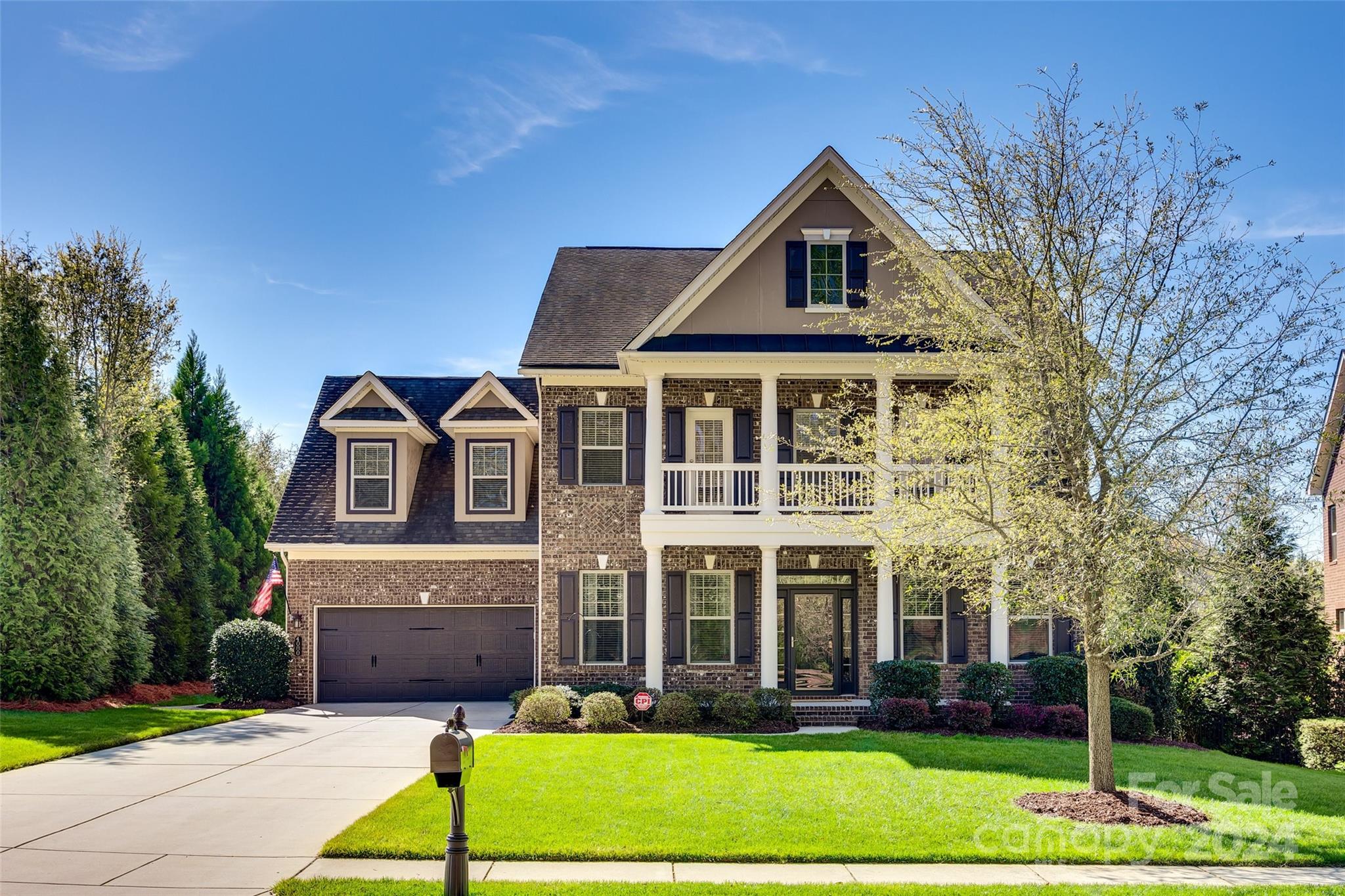 Stunning full brick home in sought after Barber Rock neighborhood! Luxury touches throughout with detailed trimwork and gorgeous coffered ceilings in the living room. The gourmet kitchen is equipped with upgraded appliances like a Bosch dishwasher, an expansive island, and roll-out drawers for added convenience. Enjoy purified water with a full house filtration system and control your home's temperature with Nest thermostats on both levels. Outdoor living is a delight with a covered front porch, upstairs balcony, screened back porch, and stamped concrete patio with a Sunsetter awning. Upgraded landscaping, leaf-filtered gutters, and a full yard irrigation system makes maintenance is a breeze. Barber Rock is centrally located in Indian Land between Ballantyne and Fort Mill and includes access to community amenities like an outdoor pool, playground and more. Don't miss out on your chance to call this meticulously crafted home yours!