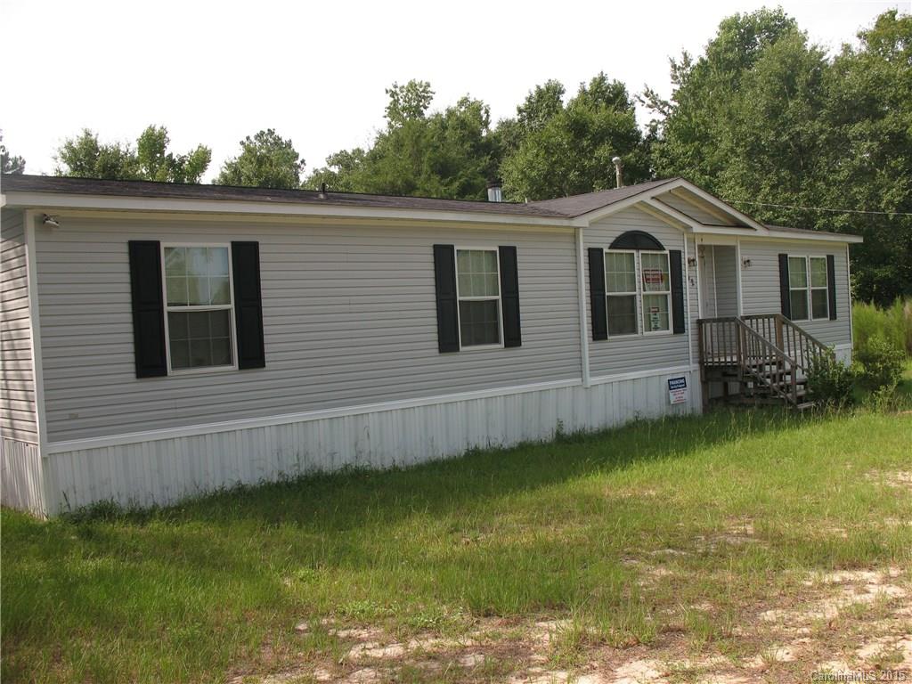Like New! 2008 Oakwood 4 Bedrooms 3 Full Baths Garden Tub Separate Shower Stone Fireplace in Living Room Central Heat and Air New Carpet and Linoleum Built in Appliances 5.4 Acres 3 ½ in swamp land gives privacy 1 ½ to landscape. Mayberry Subdivision. Financing for most credit situations. Lower scores require minimum 10% dn Better scores 5%.