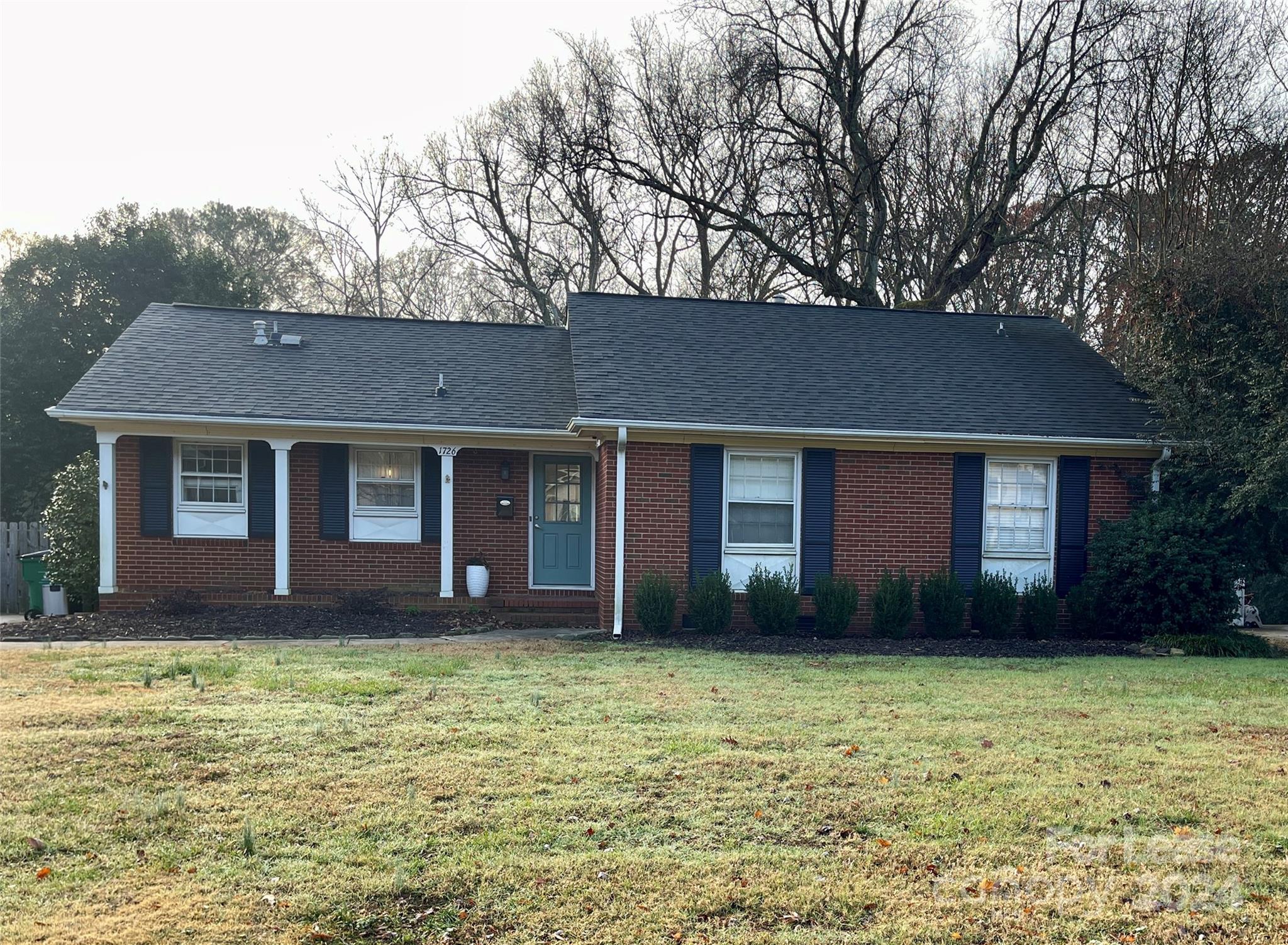 This brick ranch in the desired Starmount neighborhood has a completely fenced-in backyard, is updated, and ready to welcome a new tenant TODAY! The 3 bedroom 1.5 bath house sits on a half acre with 1,471 SF. The lot includes a storage shed and back patio with multi-level planters and a high top table with stools for your outdoor enjoyment. Full bathroom has been renovated with a double quartz sink and custom tile flooring. Spacious living room with a bay window overlooks the large backyard, and is separated by a half wall from the home's entry. The half bath is in the master bedroom, which also has a walk-in closet. The kitchen features an open layout that includes a formal dining area, with enough space for a breakfast nook and even a corner office. The kitchen and dining area is anchored by a built-in non functional fireplace. Washer and dryer provided.  Tenant pays utilities and maintains the lawn. (Lawn care provider available.) An application is required to view the property.