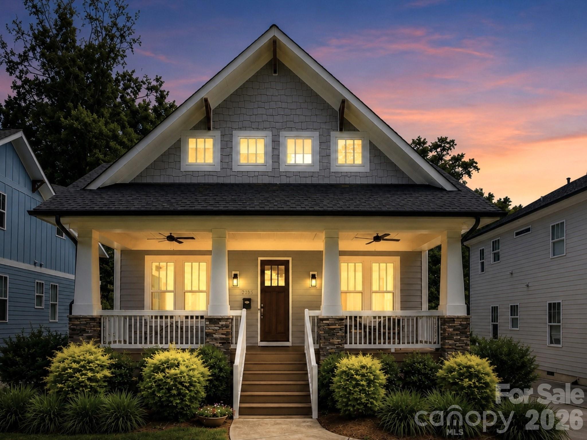 Custom built Craftsman style home offering 4,700 square feet of combined finished and expansion-ready space. Sought-after Charlotte location, just minutes from Uptown and steps from Plaza Midwood. A covered front porch welcomes you inside this thoughtfully designed interior featuring hardwood floors, neutral paint, detailed trim work, designer lighting, and ten foot ceilings. Gourmet kitchen showcases Shaker style custom cabinetry with soft-close doors and drawers, subway tile backsplash, professional six-burner gas range, 64-inch refrigerator, and generous island with seating. Adjacent dining and living areas, complete with a gas fireplace and built-in shelving, create an inviting open concept layout for both everyday living and entertaining. A versatile flex room with French doors provides the ideal space for a home office, playroom, or guest bedroom. Upstairs, the primary suite offers a peaceful retreat complete with a sitting area and spacious walk-in closet enhanced by a custom closet system. The spa-inspired ensuite features a frameless glass shower, soaking tub, and dual sink vanity. Two secondary bedrooms, each with its own full bathroom, along with a well-equipped laundry room with a sink and cabinetry, complete the upper level. Enjoy outdoor living on the screened porch overlooking the level, tree-lined backyard with a patio and detached two-car garage. The unfinished, over 1,500 square foot walk-out basement, already plumbed for a bathroom, offers endless potential. Ideally located near Veterans Park with a playground, tennis and pickleball courts, soccer and baseball fields, disc golf, and a splash pad. Just moments from popular dining, breweries, coffee shops, grocery stores, and convenient access to I-74 and area interstates.