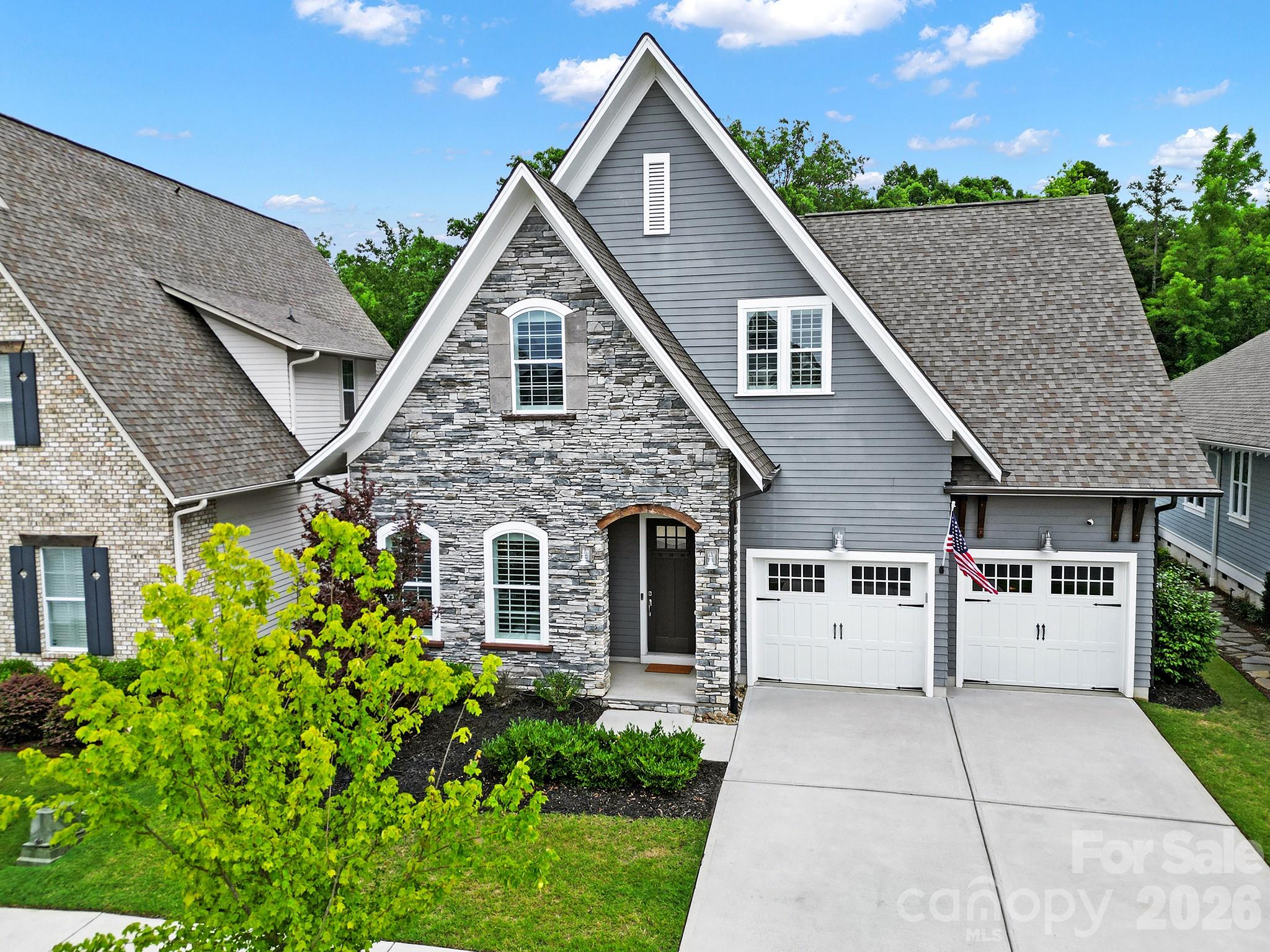 Welcome to Masons Bend, one of Fort Mill's most sought-after neighborhoods! This breathtaking home is full of design, style and she has been meticulously maintained. Upgrades include Eze Breeze screened porch with stacked stone fireplace. Outdoor entertaining space with luxury travertine throughout, stacked stone gas fire pit, grilling and bar area all overlooking a private, wooded backdrop. Open floor plan. Gorgeous chef's kitchen with large island and SS appliances. Custom closet in owners suite, spa owners bath, wood shutters, roman shades, custom built-ins, shiplap and epoxied garage floor. Tons of storage. 2 Car Garage. Fenced private backyard. So many upgrades, you must see it for yourself! Masons Bend resides on the shores of the Catawba River and boasts hiking/biking trails, parks, clubhouse, junior Olympic pool, splash pool, fitness center, playground, entertaining pavilion and kayak/canoe launch. Award winning schools. Low SC taxes. Easy access to I-77, Airport and Charlotte.