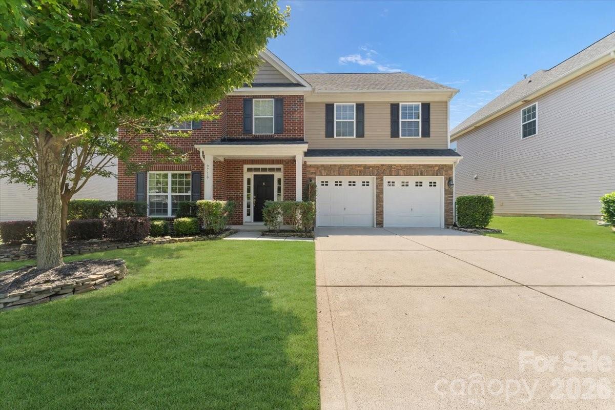 Verbally under contract... awaiting signatures from relo company. Welcome to Kingsbridge — one of Steele Creek's most established and beloved neighborhoods, where mature trees line the streets, a community pool anchors the summers, and everything you need is minutes from your front door. This beautifully maintained four-bedroom home makes its first impression count. A two-story entrance foyer sets the tone immediately — engineered hardwood floors, soaring ceilings, and elegant arched doorways that frame each space with architectural character. This is a home that knows exactly what it is and delivers from the moment you walk in. The family room invites you to settle in around the warmth of gas logs while the kitchen — thoughtfully designed with abundant cabinetry, granite countertops, and a dedicated pantry — gives you everything you need to cook, organize, and gather with ease. The main level flows naturally and makes everyday living feel effortless. Upstairs the primary bedroom is a true retreat — tray ceiling overhead, two closets to share or claim entirely as your own, and a beautifully appointed ensuite bath featuring two separate vanity areas, a walk-in shower, and a soaker tub that makes the end of every day worth looking forward to. The laundry room is conveniently located on the same level as all the bedrooms because someone who actually lives this floor plan designed it. The secondary bedrooms are equally impressive — multiple walk-in closets give everyone generous space, and the large, shared bath with dual vanity sinks means mornings run smoothly for the whole household. The fourth bedroom deserves special mention — oversized, versatile, and complete with a large walk-in closet it functions beautifully as a bonus room, a second primary suite, a home office, or whatever your life needs it to be right now. Step outside and the large paver patio welcomes you into a private backyard canopied by mature trees that create the kind of natural privacy that new construction neighborhoods spend decades waiting for. This is your outdoor living space — peaceful, beautiful, and ready for every season.
Beyond the front door Kingsbridge delivers on location in every direction. The community pool is the neighborhood gathering place all summer long. RiverGate Shopping Center is minutes away with five grocery stores within a five-mile radius. Major roads keep your commute manageable and the best of Charlotte within easy reach. Some neighborhoods check the boxes. This one checks them all — and the home itself is the reason you stay.