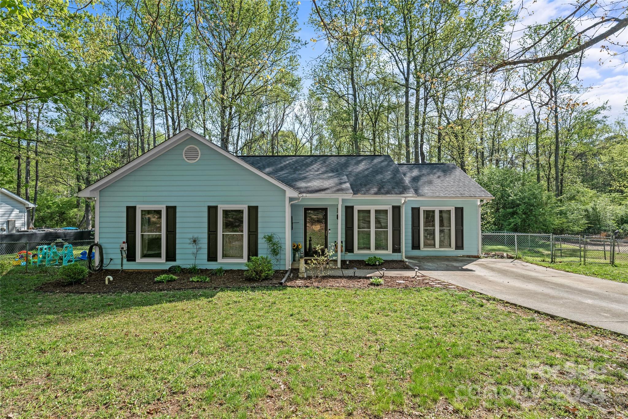 This charming home features 3 bedrooms/2baths and a cathedral ceiling in the living room, breakfast & kitchen area. There are two flex areas off the kitchen that can be used as an office or large pantry. One of the flex spaces is being used as a bedroom currently. The home has a newer HVAC, roof, all windows have been replaced and freshly painted exterior just last year. The primary bedroom has a trey ceiling and en suite bathroom. Take advantage of the private, fenced backyard with 2 sheds that are being left for entertaining or storage. 

Enjoy walks in the quiet neighborhood of Enchanted Forest, which offers no HOA. You will love the convenience of all the shopping nearby and 485 is just 5 minutes away!