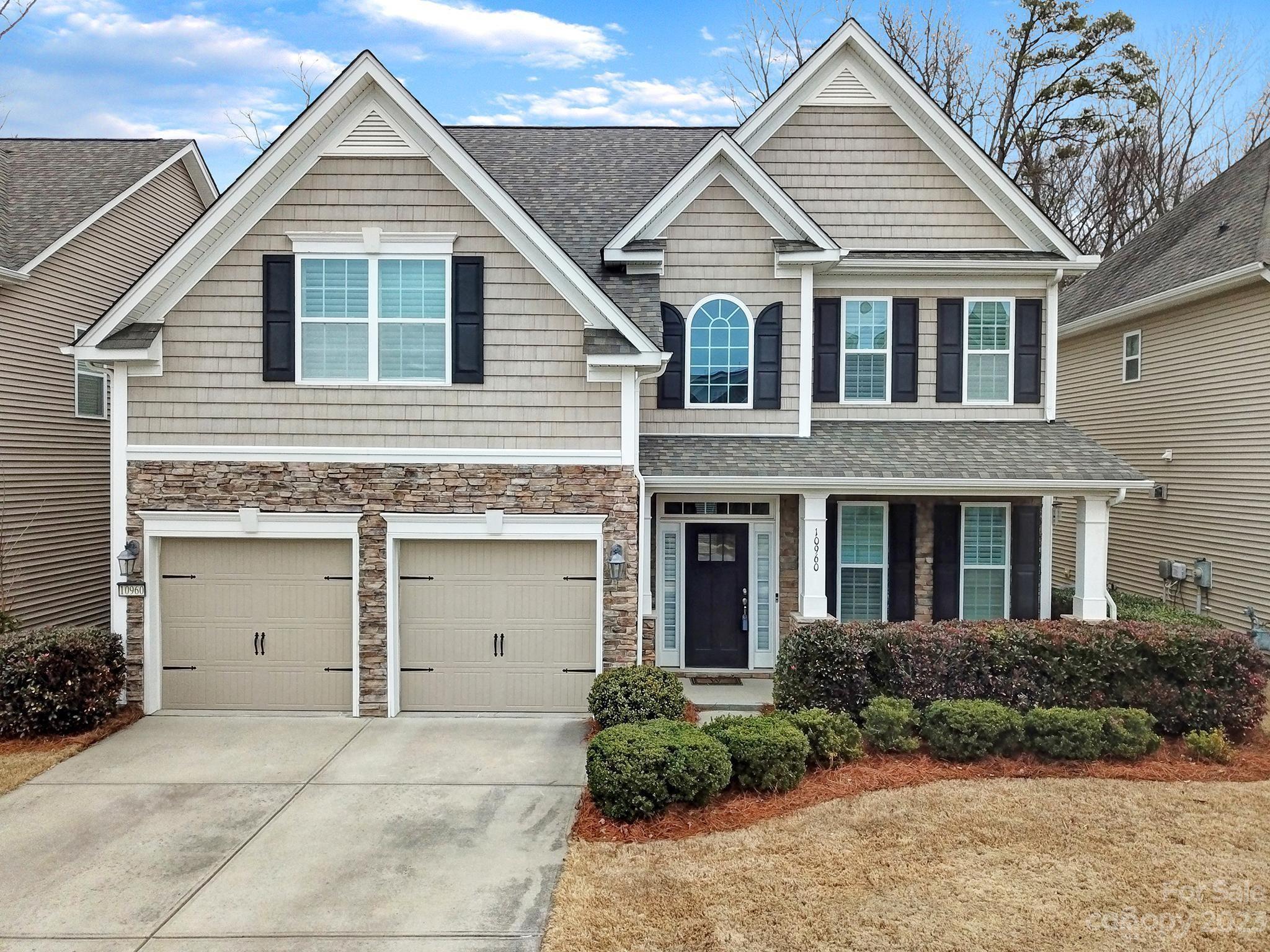 MULTIPLE OFFERS received! Offer Deadline is 1/28 at 6pm. Meticulously maintained 4BR/3BA open floor plan in highly sought after Villages at Skybrook North! Hardwood floors, custom shutters/blinds, new carpet & freshly painted throughout. Formal dining room with wainscoting and trey ceiling. First floor bedroom with full bath perfect for guests or an office. Large open family room with gas log fireplace. Oversized kitchen with breakfast bar, stainless steel appliances. Perfect for entertaining! Huge upstairs primary suite with trey ceiling, dual vanities, separate shower/tub & walk-in closet. Large bonus room could be used for media or game room. Pristine condition throughout! Home backs to woods. Easy access to 85/485/77, shopping and dining. Short distance to the new Bonnie Cone Leadership Academy and and just a short drive from Carolina International School.