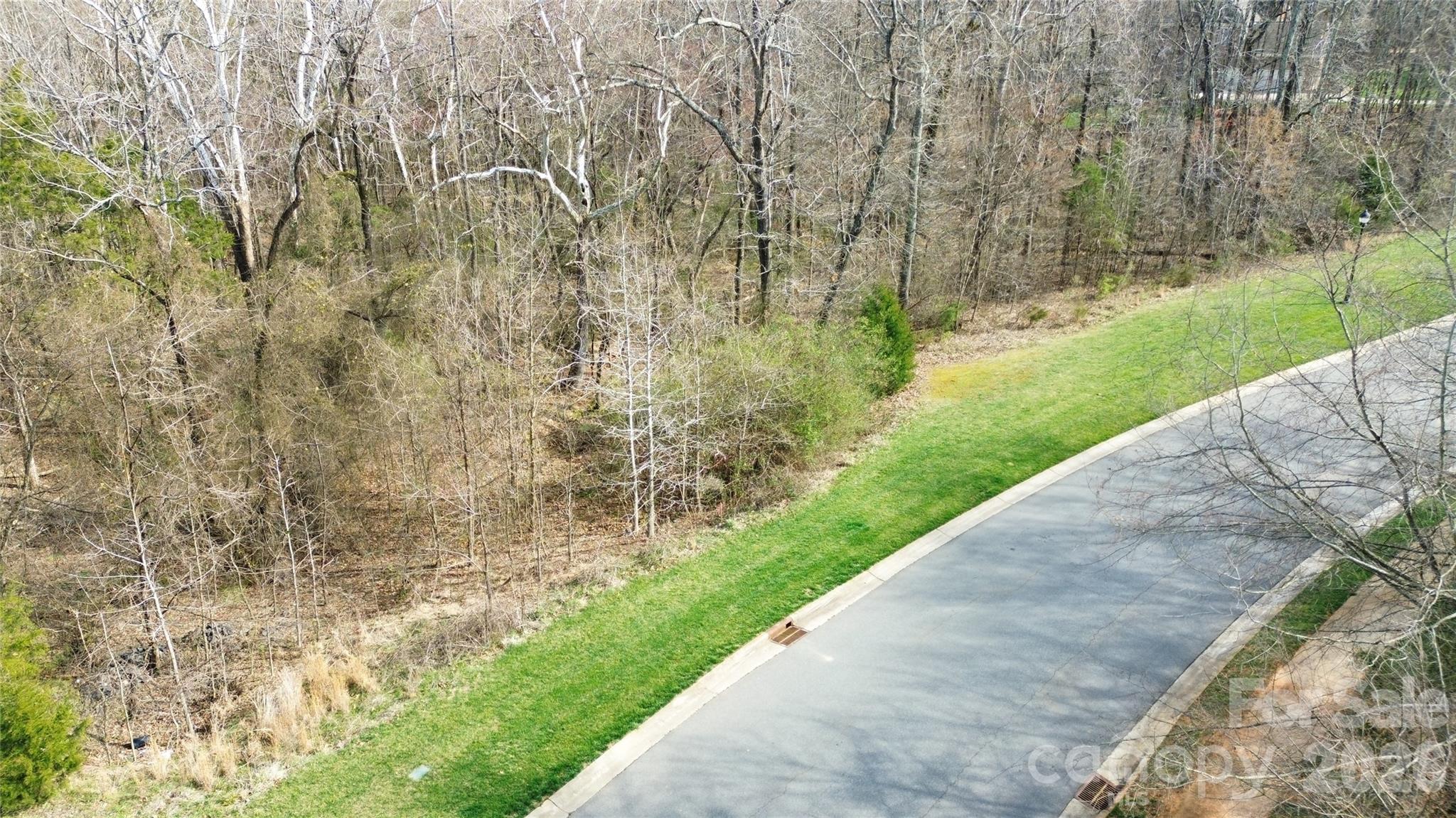 Discover 1.60 acres of peaceful, wooded land on Caliterra Dr., offering an ideal setting for a custom-built home with privacy and natural surroundings. This property is not subject to the community HOA, providing added flexibility for design and use. A designated buffer area is present on the lot and will require municipal approval prior to construction. Well and septic will be required. Excellent opportunity for buyers seeking space, seclusion, and the ability to create a personalized home environment.