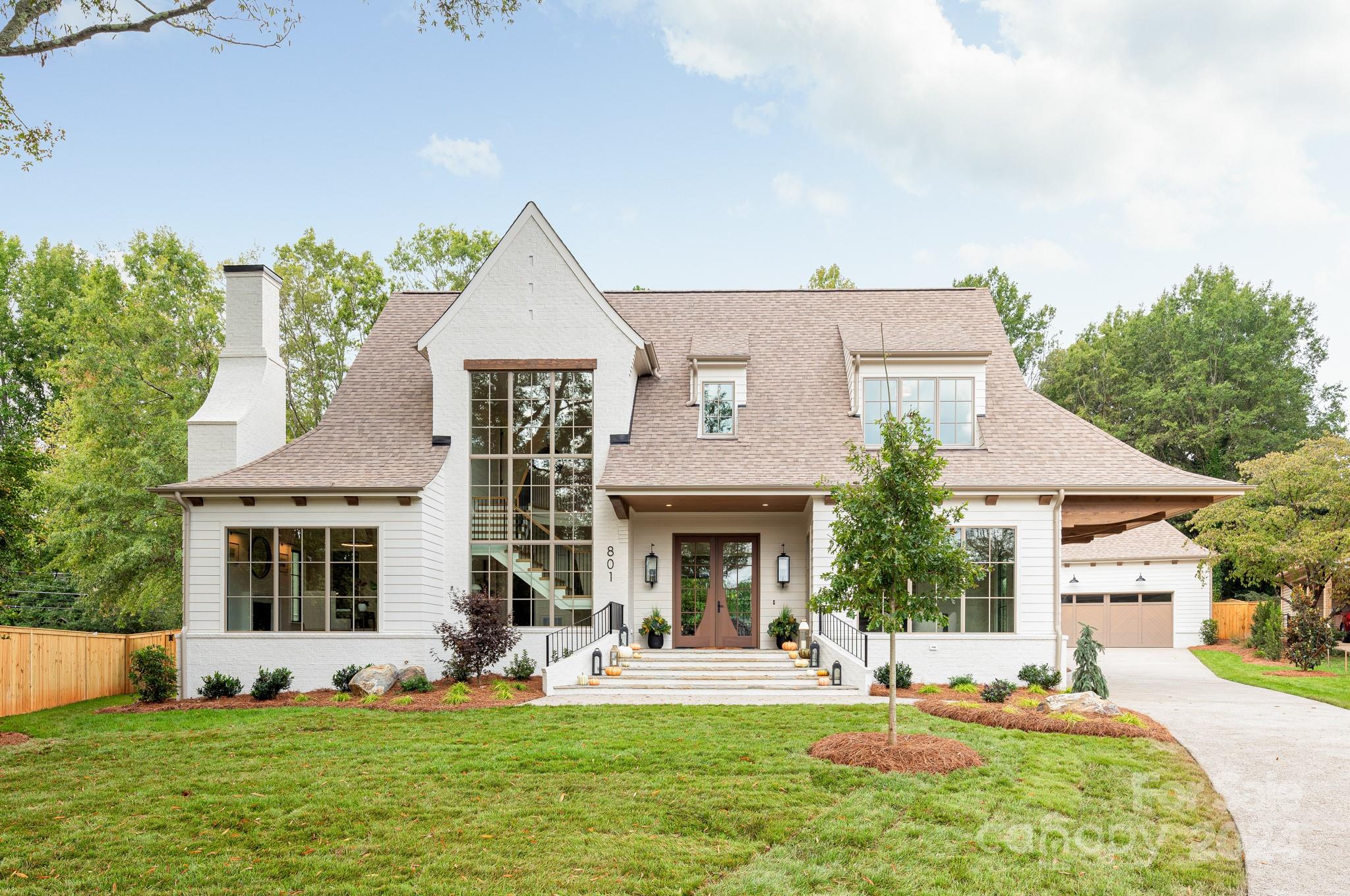 *OPEN HOUSES CANCELLED* Welcome to 801 Bridlepath, a charming new construction home by Pike Properties situated on a .49-acre cul-de-sac in Cotswold. This elegant 5-bedroom, 5.5-bath home seamlessly blends luxury and comfort. The main level offers a sophisticated dining room perfect for formal gatherings, and a cozy living room ideal for relaxation with a sliding glass door leading you to your covered back porch overlooking a spacious, private backyard—perfect for outdoor enjoyment and plenty of space for a pool! The primary suite on the main level has an oversized walk-in closet and spa-like bathroom. This home offers a convenient flex room on the main level, a full bathroom, a mudroom with back door access, and side door access from the porte cochere. Upstairs, the home has a dedicated bonus room, a laundry room, and three additional bedrooms, each with its own bathroom, plus a convenient powder bath.