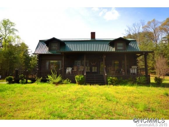 Log cabin with rocking chair front porch and a private setting. Plenty of outdoor yard space for kids, backyard chickens and a garden. The main level has wood floors, a nice sized living area, a full bath and a bedroom. Upstairs are 2 more bedrooms, a full bath and an office or flex room.