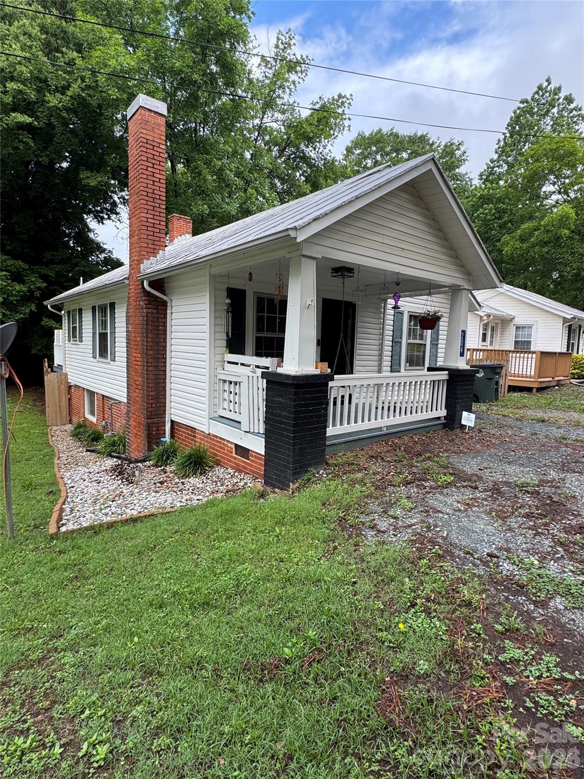 Charming and cozy 2-bedroom, 1-bath home conveniently located near downtown Wadesboro with easy access to local shops, restaurants, and everyday conveniences. This inviting home features a living room with cozy gas logs, a dining area, functional kitchen, and separate laundry room for added convenience. Enjoy relaxing on the welcoming front porch or entertaining on the back deck overlooking the privacy-fenced backyard. Perfect for comfortable living in a convenient location!