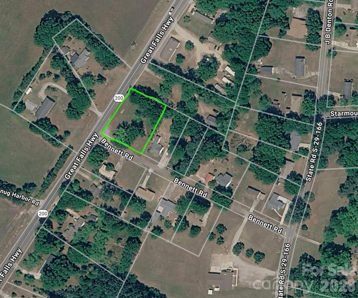 Mostly cleared ±0.70-acre corner lot at Great Falls Hwy and Bennet Rd in Lancaster, SC. Zoned for single-family or duplex residential use, this flat and usable parcel offers a great opportunity for a builder, investor, or future homeowner. County water is available. Sewer is nearby and would require extension, or septic is an option. Survey completed. Permit for a 3-bedroom septic available. If sewer service is added through an extension, subdividing the lot into two parcels may be possible. Strong visibility and flexible residential potential. Buyer to verify zoning, utilities, septic/sewer options, subdivision potential, setbacks, and permitting with Lancaster County.