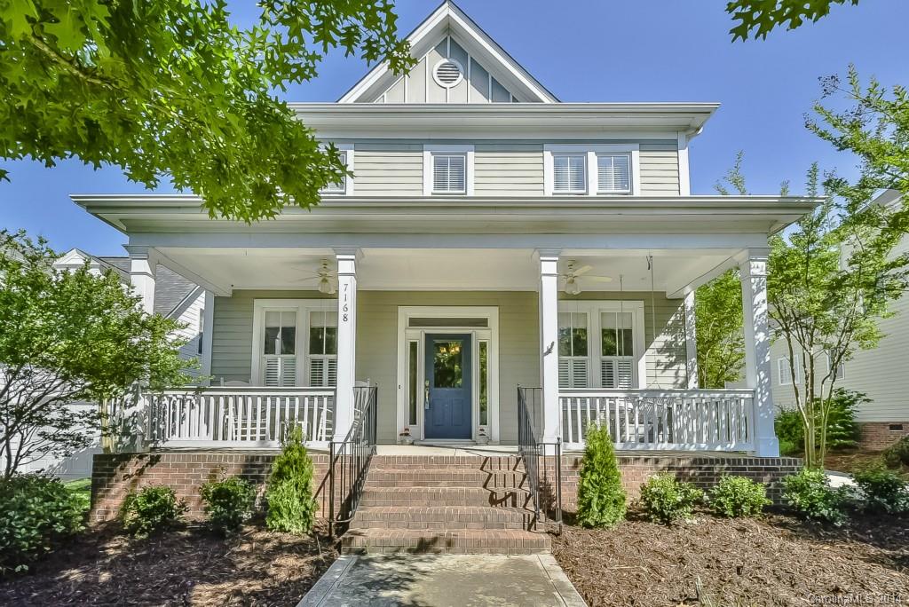 Beautiful home in the sought after community of Baxter Village, Located in the award winning School District of Fort Mill.   The home features a formal dining room, hard wood floors on the main level, bright and airy kitchen with breakfast nook, Rocking Chair Front Porch, and check out the large detached garage.  Fresh paint makes this home look like new. Home has a fenced wooded backyard that borders The Baxter Trail System which is ideal for a run, walk or bike ride. Put this on your LIST!!