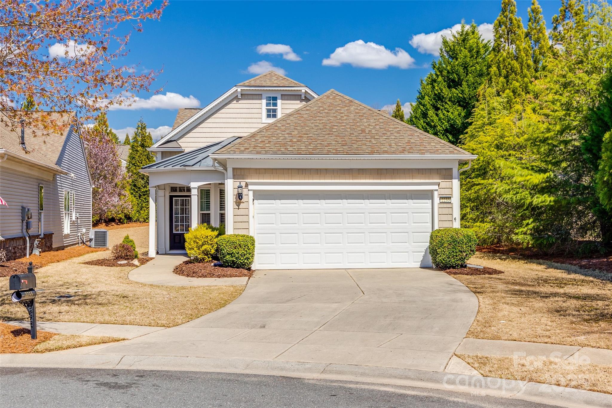 Fabulous opportunity to be in Sun City in a totally move-in ready Pine Spring plan w/ sunroom! All new fresh interior paint and luxury vinyl plank flooring throughout. Property is nicely upgraded with beautiful plantation shutters too. Kitchen features SS appliances, gas range, solid surface counters and tile backsplash. Kitchen island can be easily removed if you prefer a table. Large shower, dual sinks & roomy walk-in closet complete the primary bedroom suite. You'll have a guest bedroom plus a 3rd room for an office or den--your choice. Relax in the sunroom or on the pretty paver patio. The back yard has mature trees for privacy. Also new epoxy floors in the garage! Home is situated at the front of the community making access to area shopping and restaurants a breeze. All of this at one of the area's premier 55+ communities w/ resort style of amenities. Come discover it today!