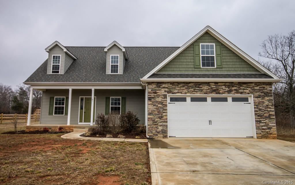 Stylish, like-new home!  HW flooring greets you & continues into Main Level Office w/privacy door & GR w/gas FP & lighted fan. Kitchen features sleek granite, backsplash, Cherry cabs, SS appls, electric cooktop, dual ovens & eat-in bar, plus Brkfast area w/deck access.  Master down floorplan w/HUGE WIC, dual vanities, tub, sep tiled shower & tile floor. Upper level Bonus Room flanked by 2 BRs & tiled Guest Bath. Deck overlooks .54 ac lot. Easy access to I-77, Troutman Lowes & more.