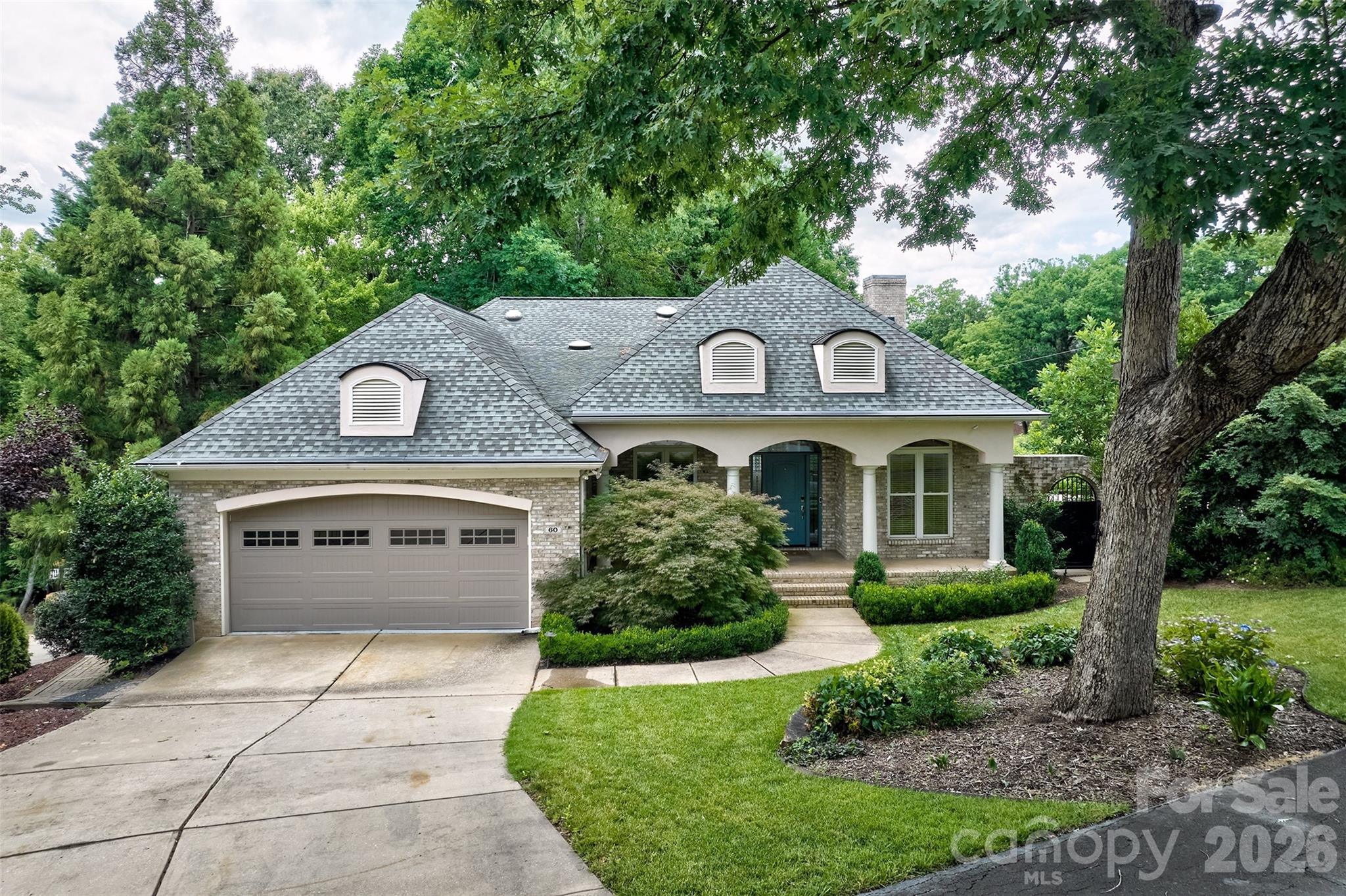 This home is THE package!  It's a ranch with a basement, ON the golf course 16th green AND has a fabulous inground saltwater pool that can be heated for all year long use!  What more could you want?  This gorgeous custom home in the gated waterfront/and golf community of River Hills on the shores of Lake Wylie.  If you are looking for outdoor living, this home will deliver.  Oversized trex deck and stone decks to enjoy the outdoors.  Pool has a beautiful waterfall and very private setting. Primary bathroom has a big walk through shower with entry from 2 full bathrooms - talk about his and her spaces and closets. Cathedral ceilings in the great room with tons of windows.  This 1 has an office, additional bedroom with ensuite bathroom, dining room, breakfast area, great room along with the primary bedroom on the main floor.  The downstairs offers another bedroom with ensuite bathroom, bonus room with a bar and big closet for wine cellar.  You can walk to your boat at the marina or walk to the country club for golf, dining and swimming.  The country club and marina are separate memberships.  The neighborhood offers miles of walking trails, garden plots, dog park, waterfront beach park with a sandy beach and picnic pavilion, several playgrounds and of course 24 hour security and gated.  This neighborhood is zoned for the new Lake Wylie High School.  Welcome to living at the lake !!