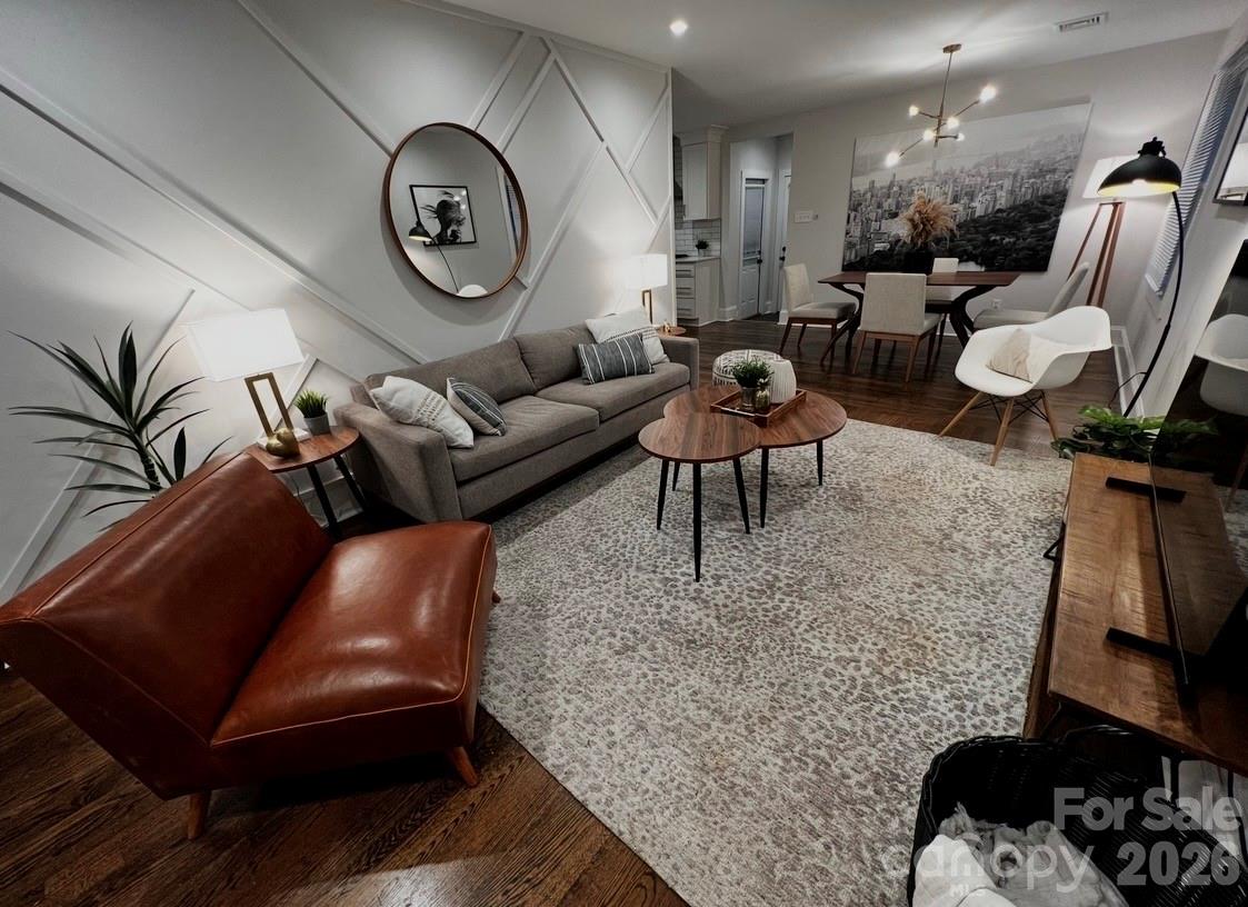 Welcome to this beautifully renovated home in Charlotte's highly desirable Collingwood neighborhood, where modern updates, timeless style, and an unbeatable location come together. Nestled on a quiet, street and situated on a level lot, this move-in-ready residence offers the perfect blend of comfort, convenience, and charm just minutes from some of the city's most sought-after destinations. Inside, you'll find a thoughtfully redesigned open-concept floorplan that creates an inviting flow for both everyday living and entertaining. Rich hardwood floors extend throughout the home, complementing the bright and airy living spaces. The stunning kitchen serves as the heart of the home, featuring sleek quartz countertops, stainless steel appliances, soft-close cabinetry, ample storage, and an open connection to the main living and dining areas. The spacious primary suite and two additional bedrooms provide flexibility for guests, or a dedicated home office. Both bathrooms have been tastefully updated with contemporary finishes and designer touches, creating a clean, sophisticated aesthetic throughout the home. Step outside to enjoy the private, fully fenced backyard—an ideal setting for pets, gardening, outdoor gatherings, or simply relaxing in your own outdoor retreat. The rear deck offers the perfect spot for morning coffee, weekend grilling, or unwinding after a long day. Location is everything, and this home delivers. Enjoy quick access to Myers Park, South End, SouthPark, Park Road Shopping Center, and the LYNX Blue Line, placing Charlotte's best dining, shopping, entertainment, parks, and employment centers just minutes away. Whether you're commuting, meeting friends for dinner, or enjoying a day out in the city, you'll love the convenience and lifestyle this exceptional location provides. Rarely does a fully renovated home in such a prime in-town neighborhood become available at this value. Don't miss the opportunity to make this Collingwood gem your next home.
