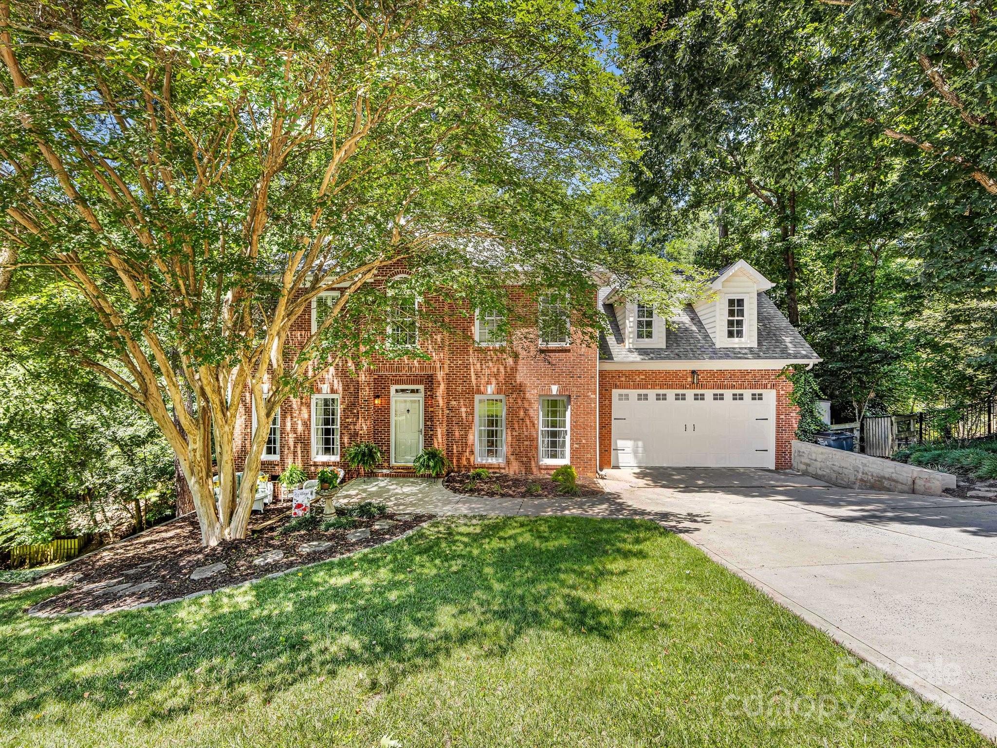 Welcome home to this move-in ready, cul-de-sac setting in sought-after Tega Cay, SC, where recreational amenities abound, including golf, tennis, swim & lake access. Located in beautiful Watertrace, this home is warm & inviting from the moment you enter. The setting is serene and the owners have lovingly maintained it. Hardwood, tile & LVT flooring plus new carpet in primary and two bedrooms. Rooms are spacious & the open floor plan is ideal for entertaining. A generous home office adjoins the living room, separated by french doors when privacy is essential. The kitchen offers a large island, great storage, granite counters & under cabinet lighting + access to the deck. The primary suite offers a lovely ensuite bath w/dual vanities, oversized shower & architectural beauty! All BR's have ceiling fans. The home has been painted throughout w/few exceptions. The backyard is a private oasis w/large patio, fire pit & fun play set for the littles! Come see why Tega Cay is the place to be.